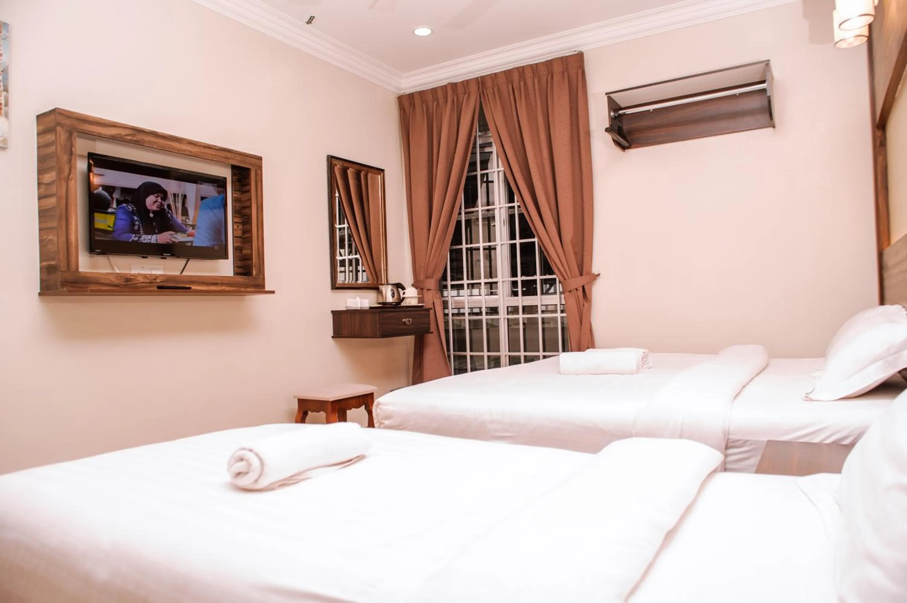 Bed in Wan Alyasa Hotel