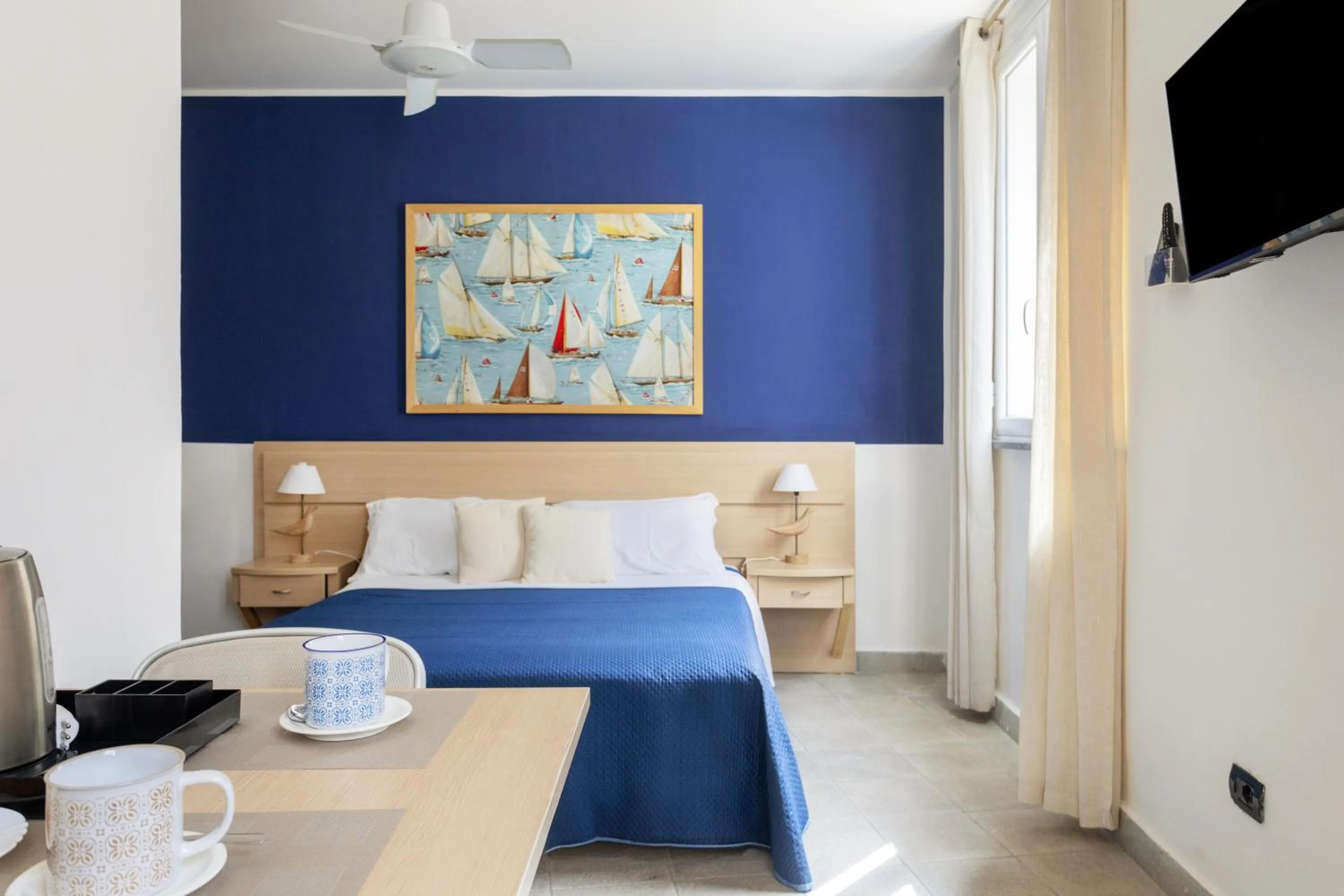 Photo of the whole room, Bed in Residence Stella Marina