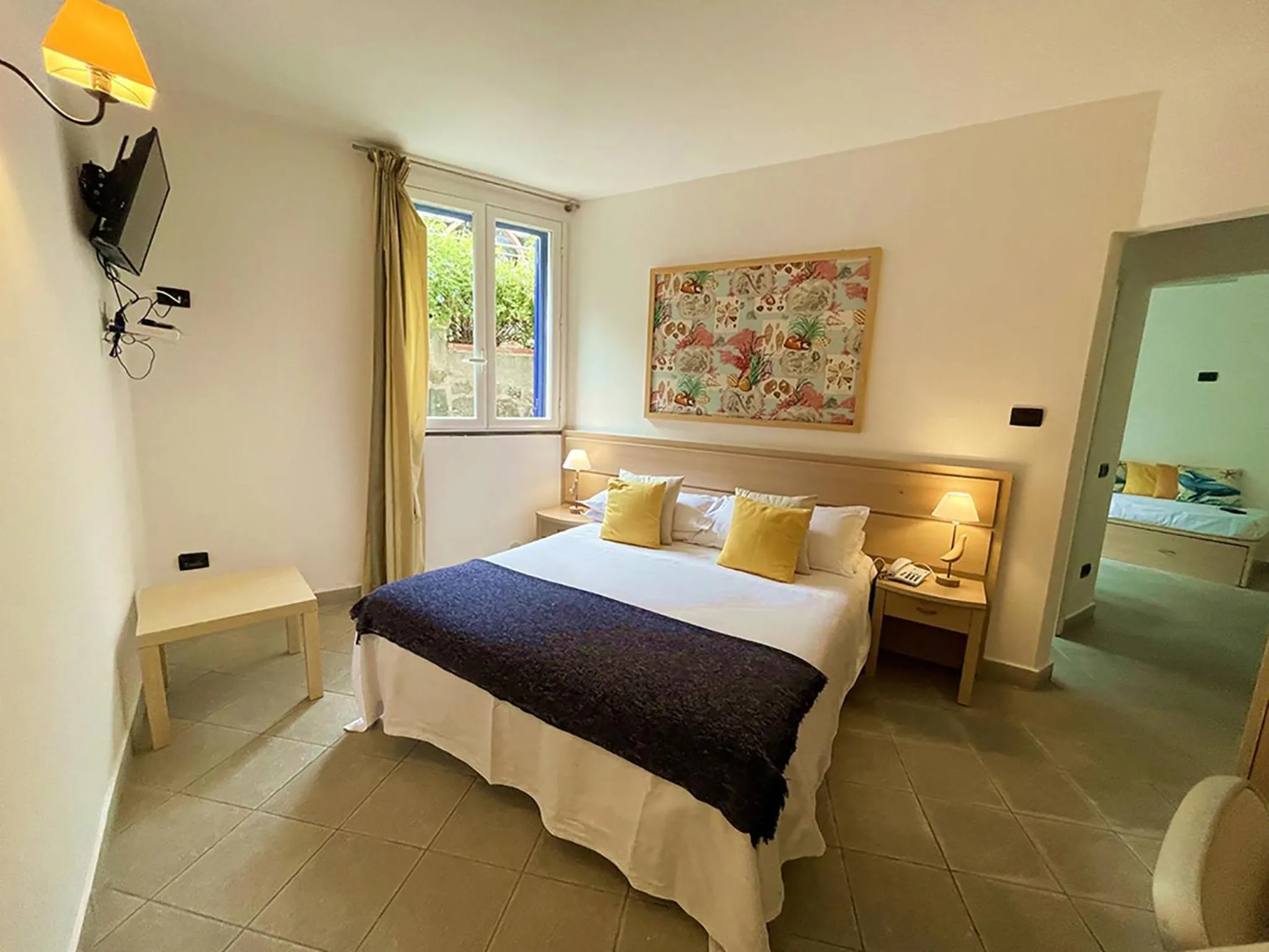 Photo of the whole room, Bed in Residence Stella Marina