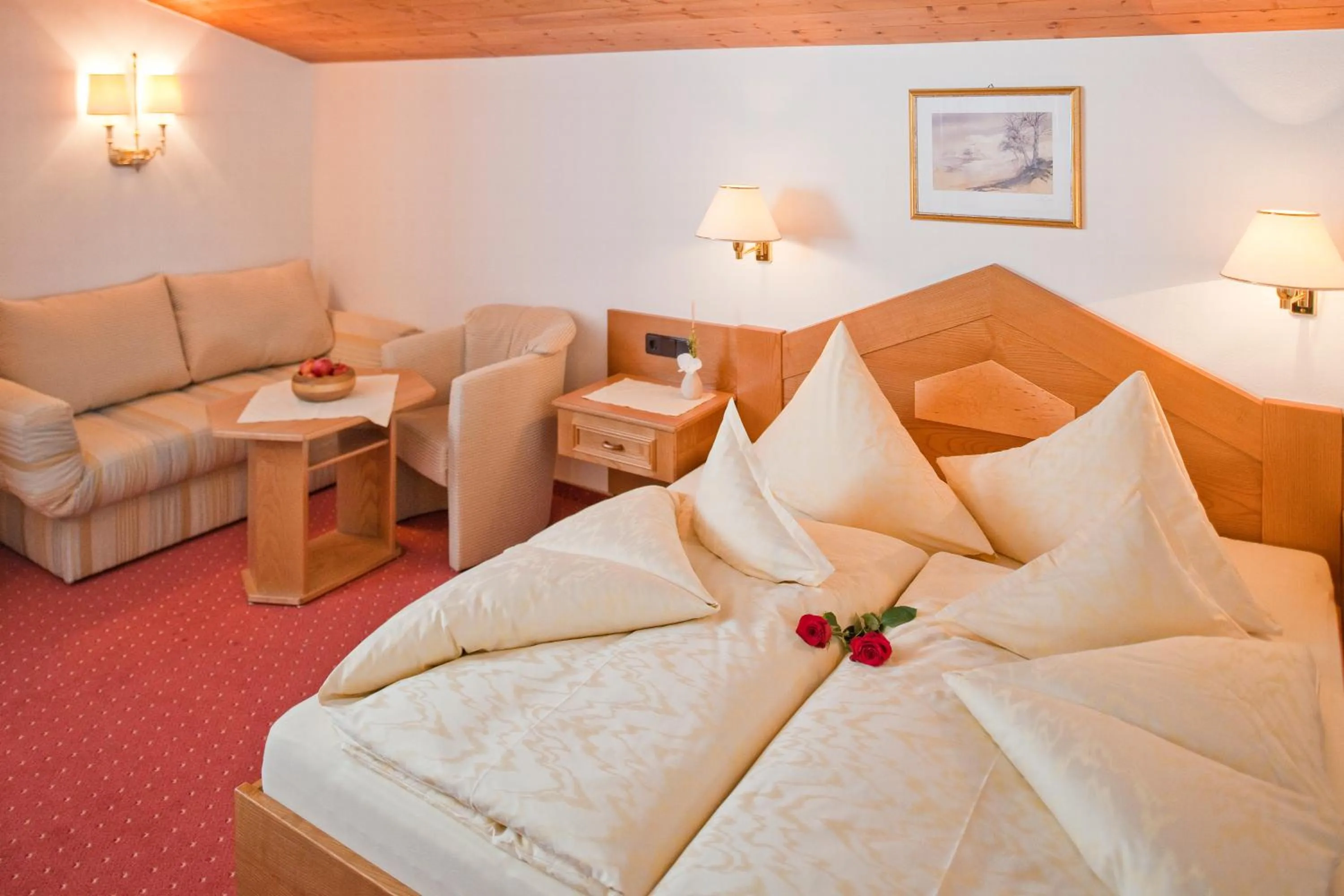 Bed in Hotel Jagdhof Bed & Breakfast