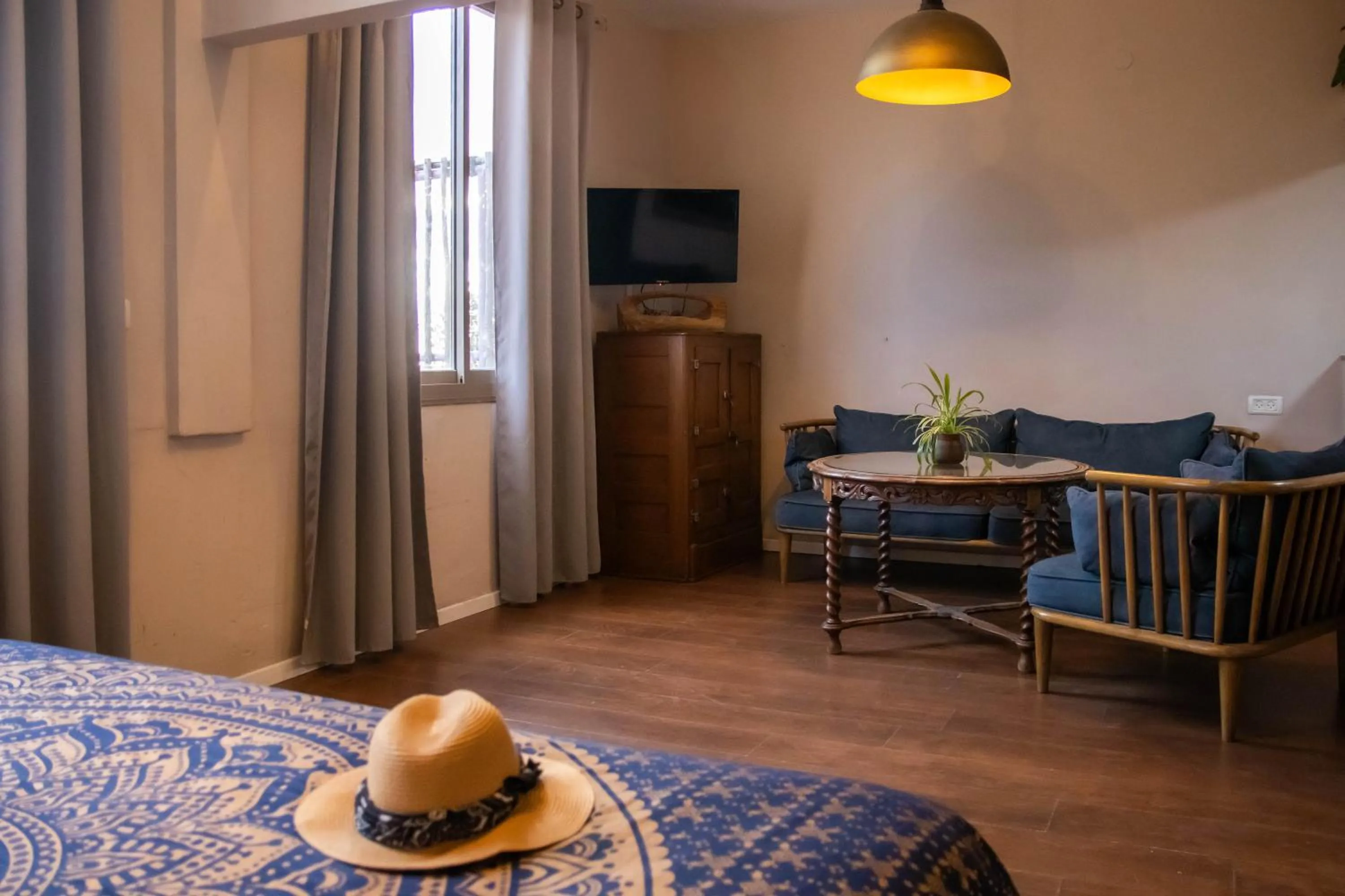 Seating area, Bed in Beit Oren Hotel