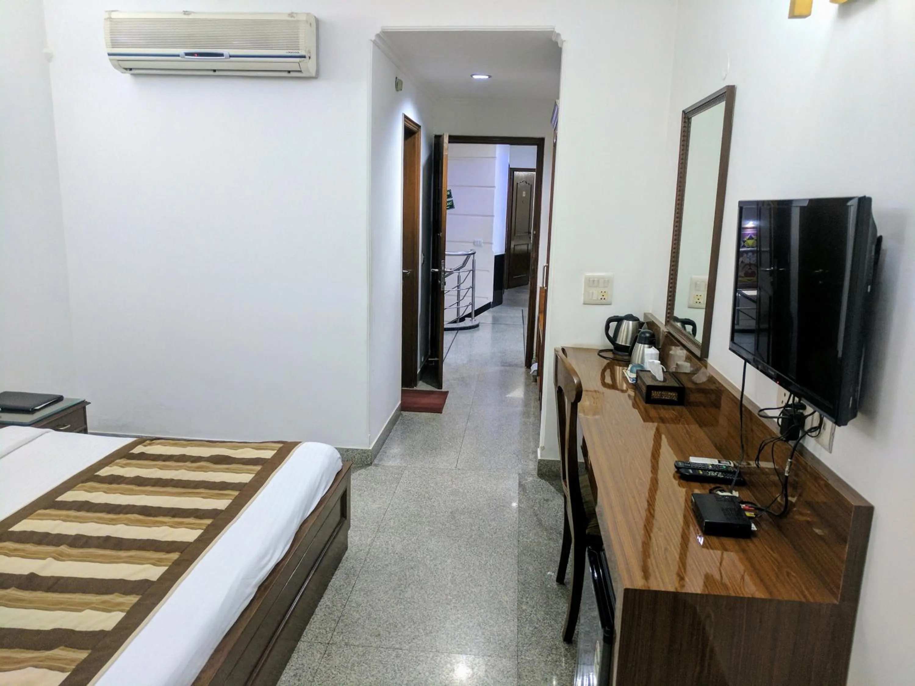 Bed in Hotel Exotica Leisure Valley, Gurgaon