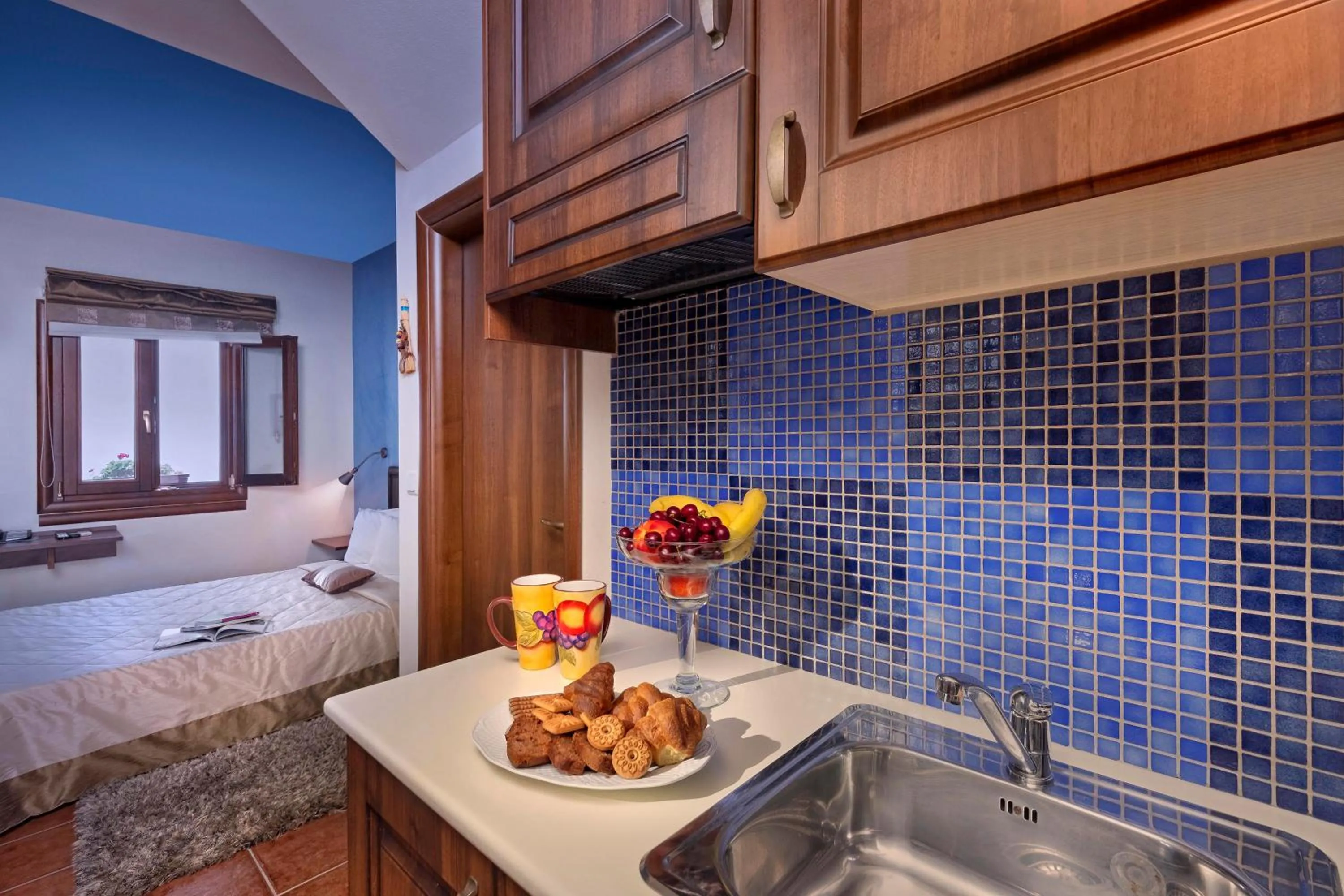 Kitchen or kitchenette, Bed in Hotel Petradi
