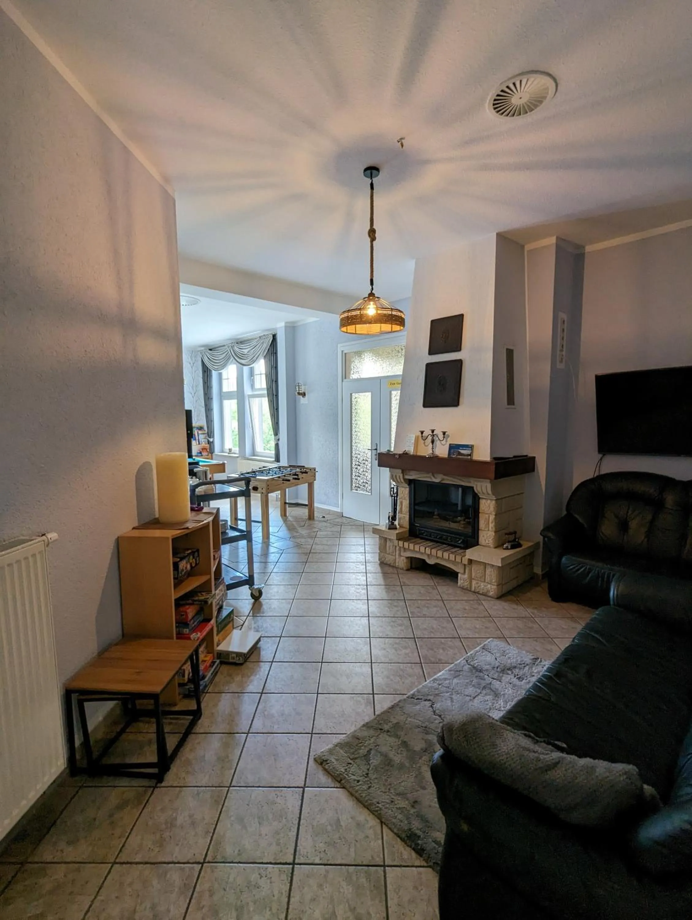 Communal lounge/ TV room in Waldgasthaus & Berghotel Steinerne Renne