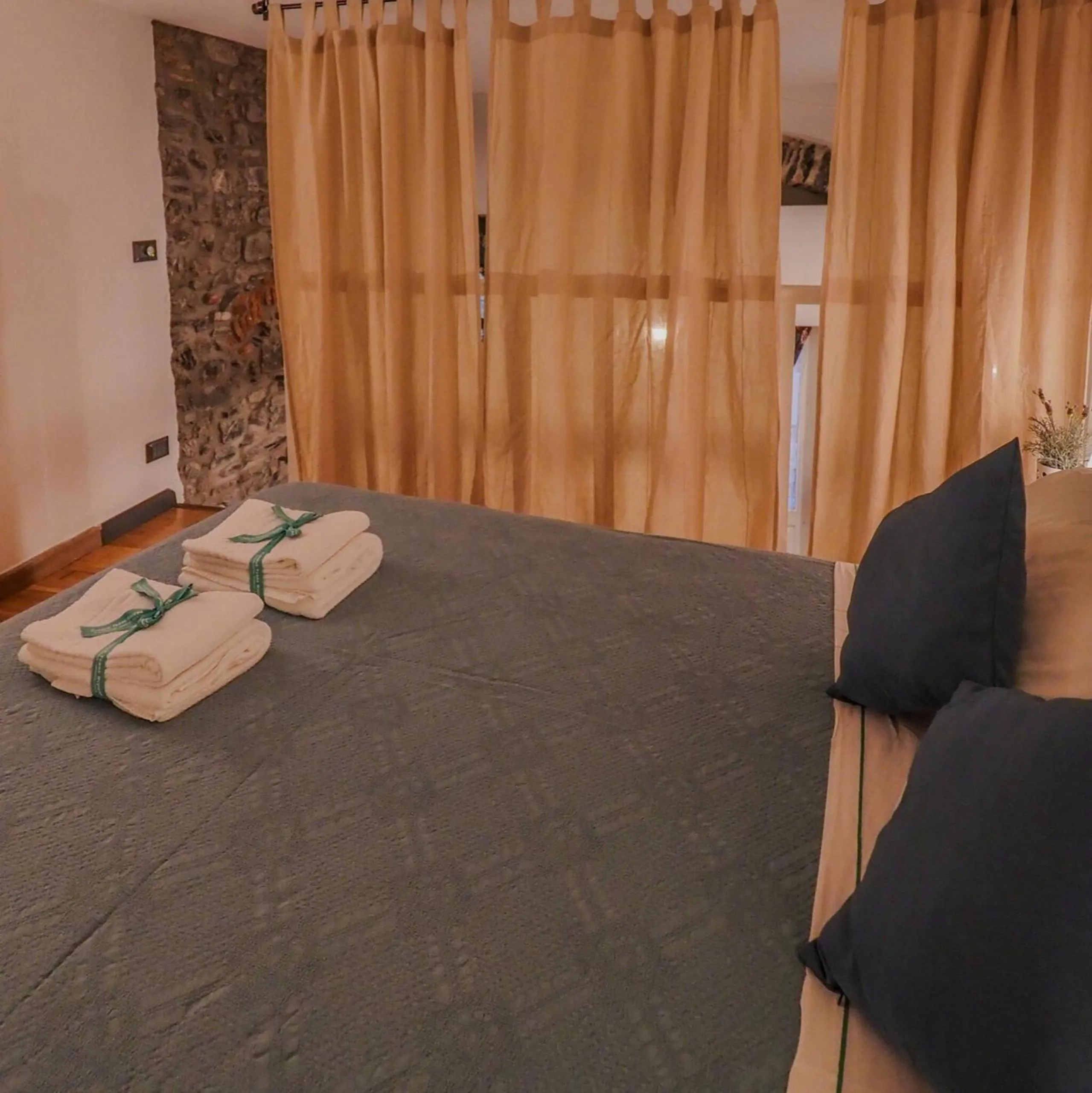 Bed in Petrella's Point Studio with AC