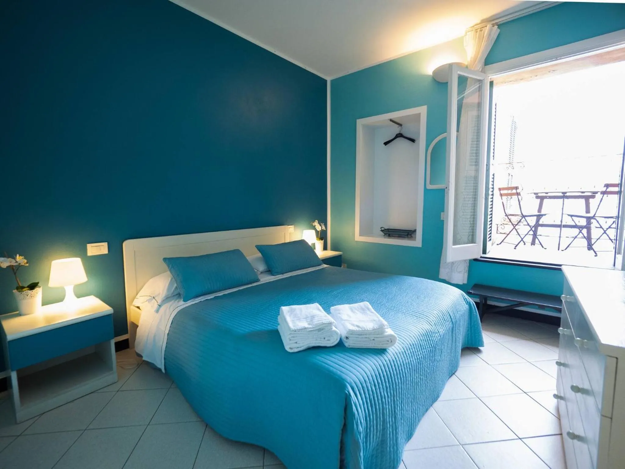 Bed in Ventegà Sea View Apartment with Balcony