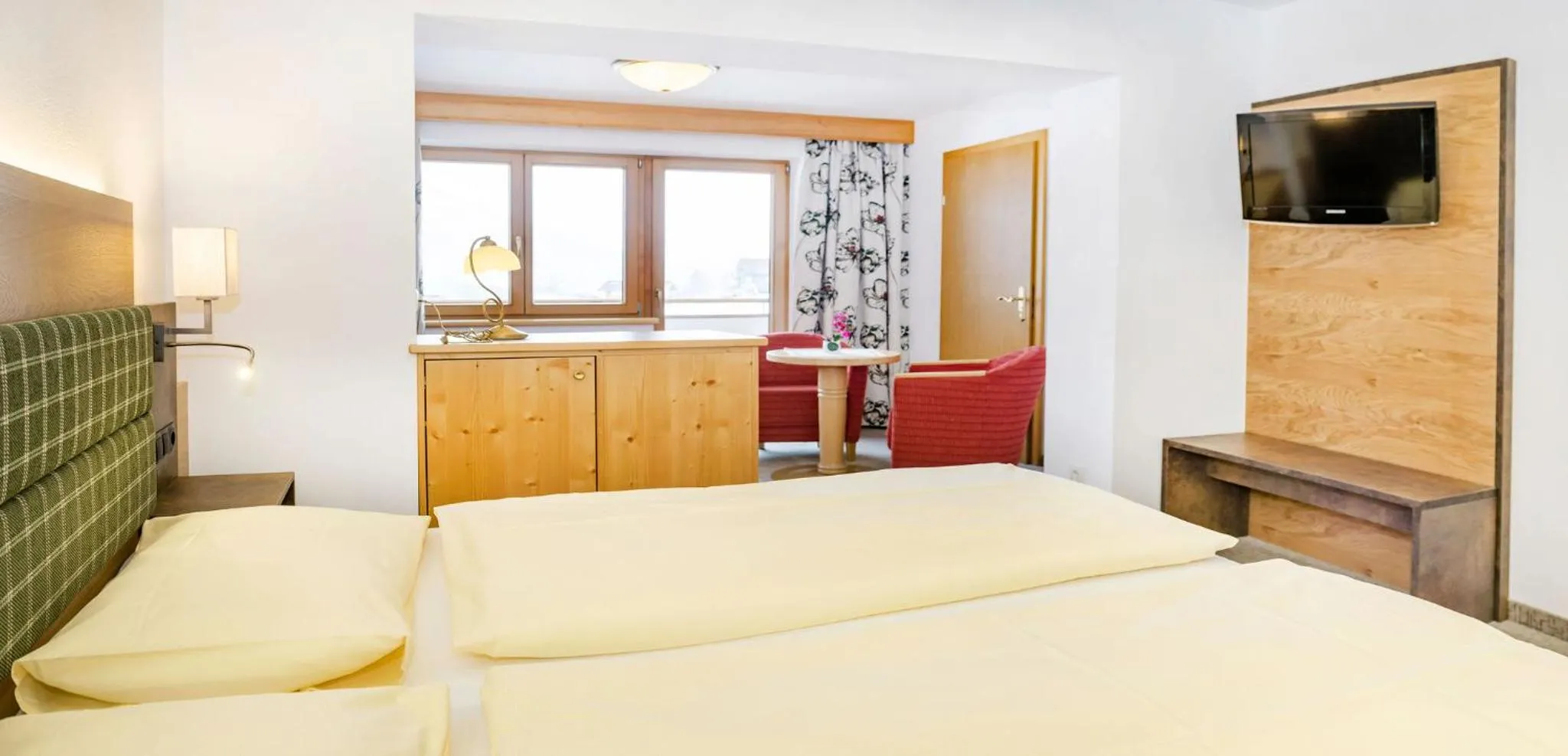 Photo of the whole room, Bed in Landhotel Tirolerhof - Wildschönau - PREMIUM Card im Sommer