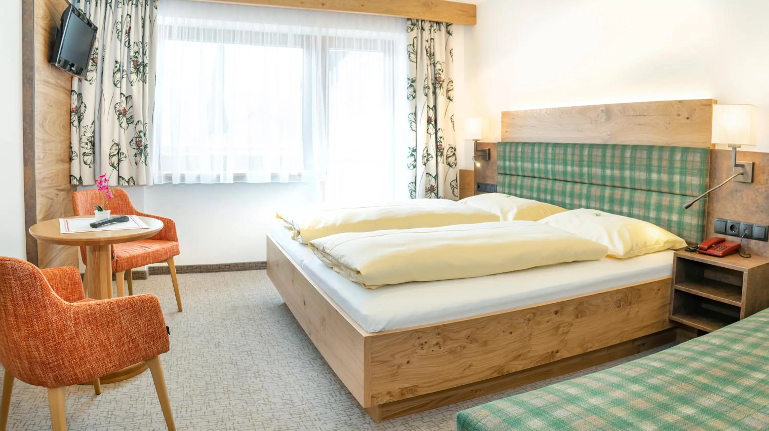 Photo of the whole room, Bed in Landhotel Tirolerhof - Wildschönau - PREMIUM Card im Sommer