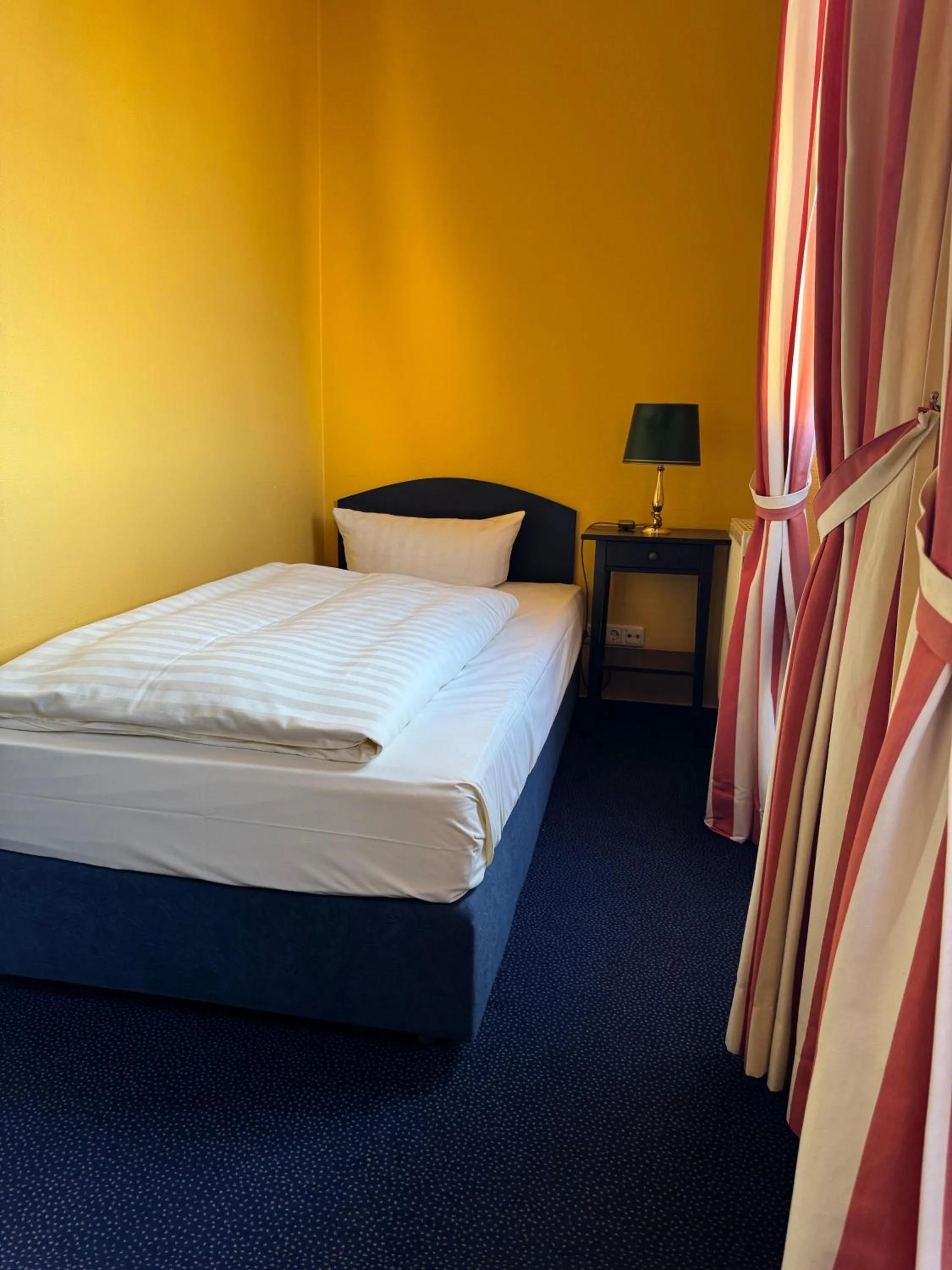 Bed in Hotel Schweriner Hof