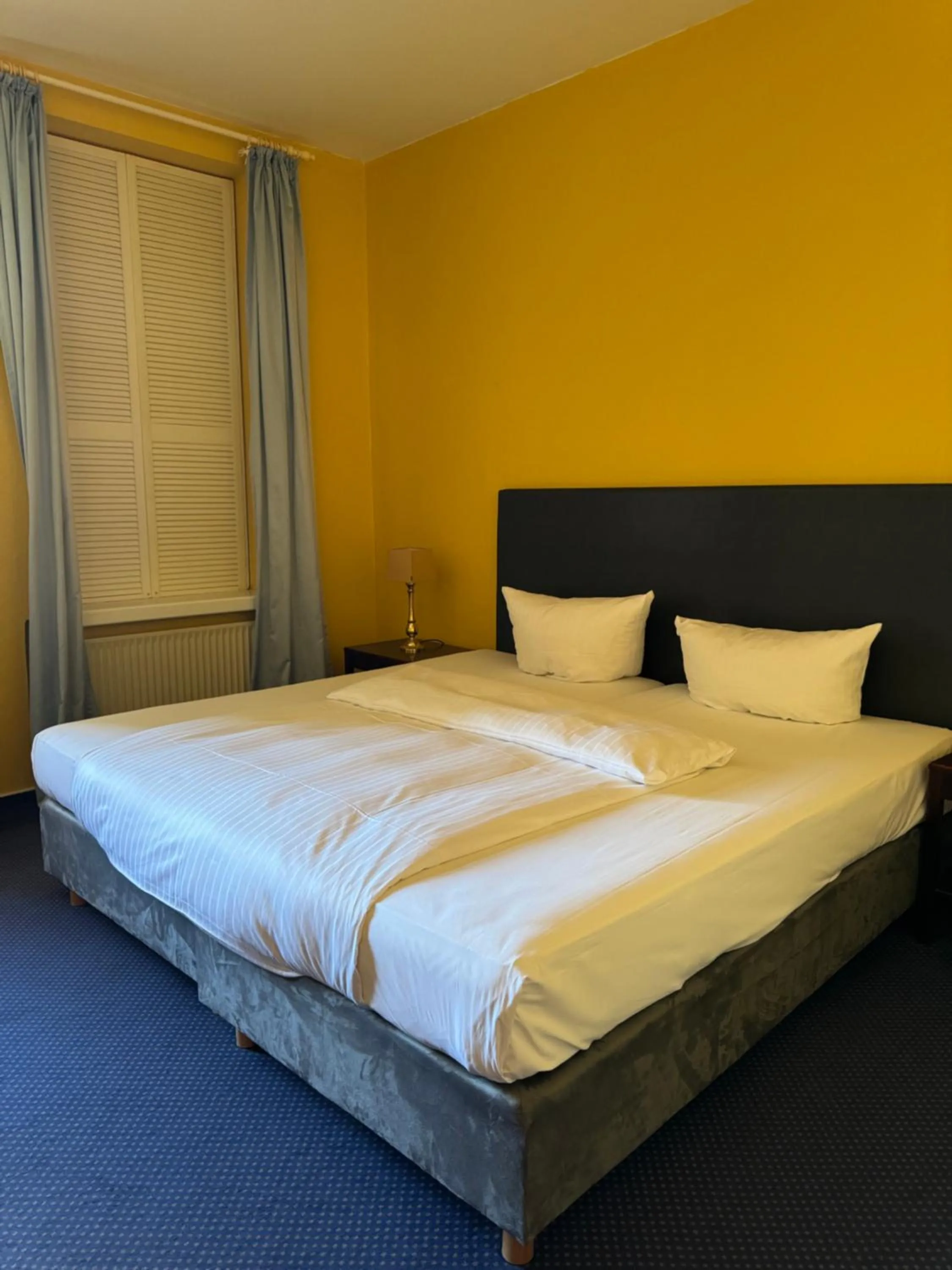 Bed in Hotel Schweriner Hof