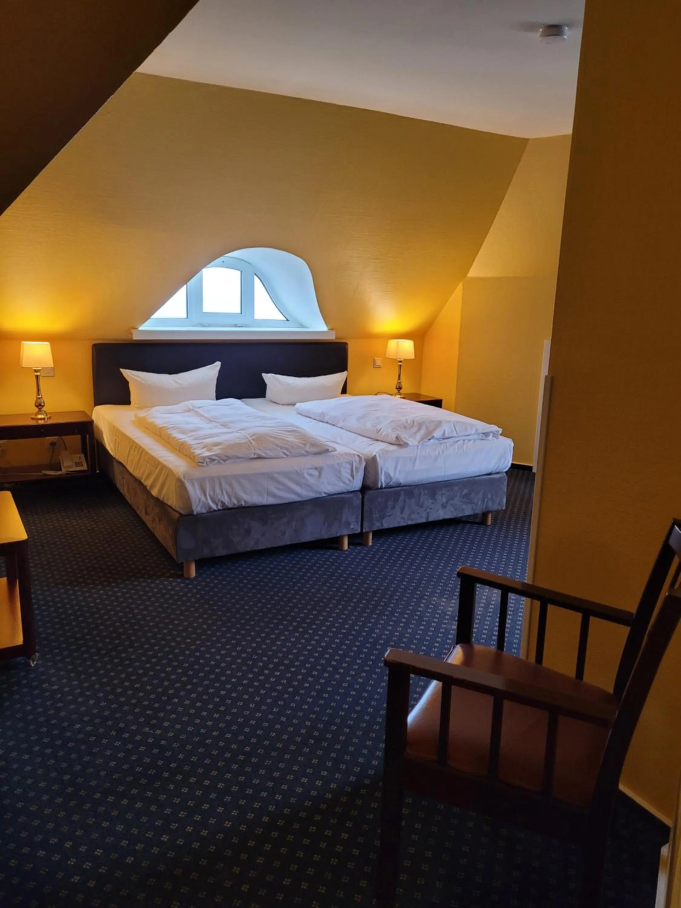 Photo of the whole room, Bed in NP Hotel Schweriner Hof