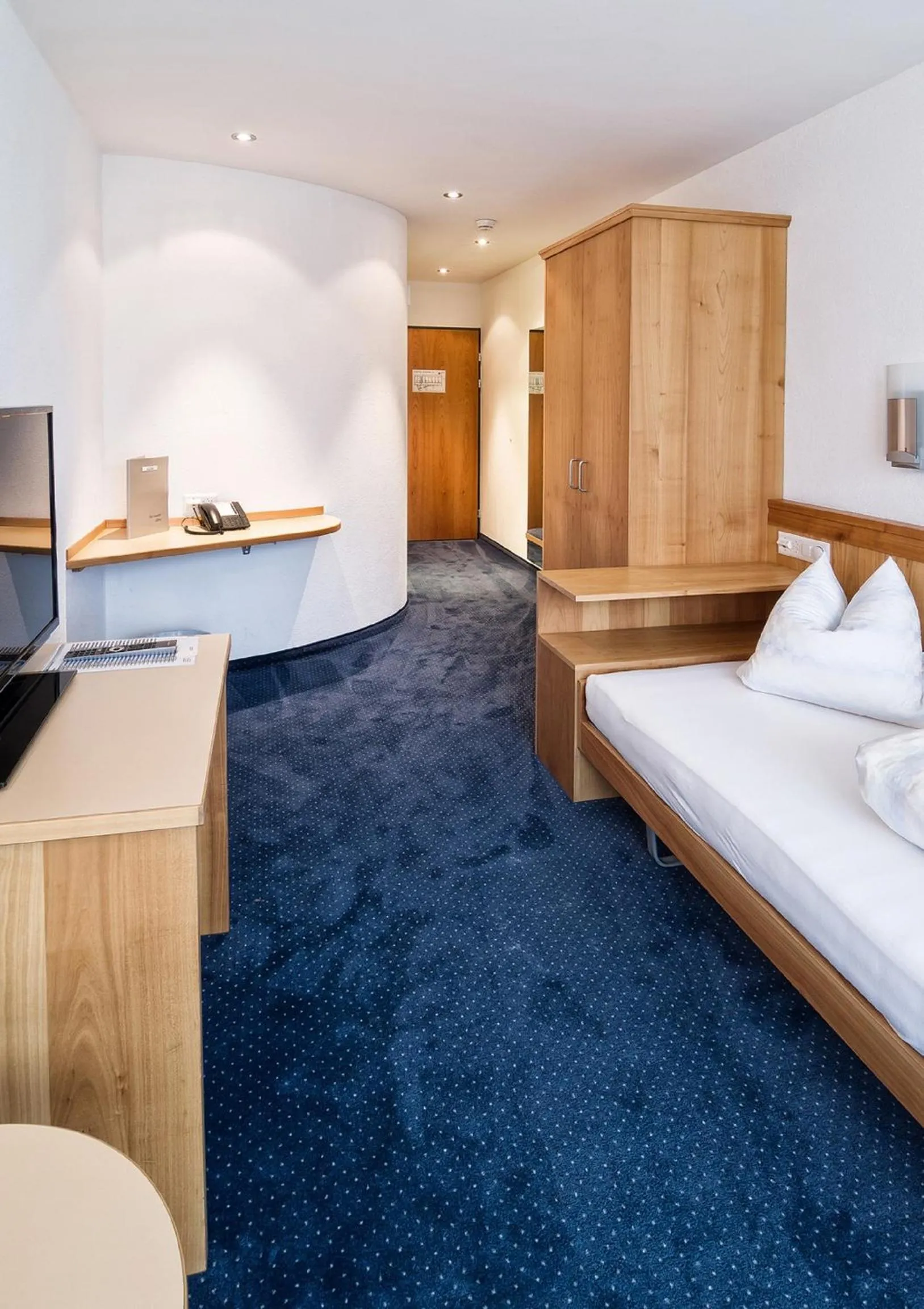 Photo of the whole room, Bed in Hotel Rössli Tufertschwil