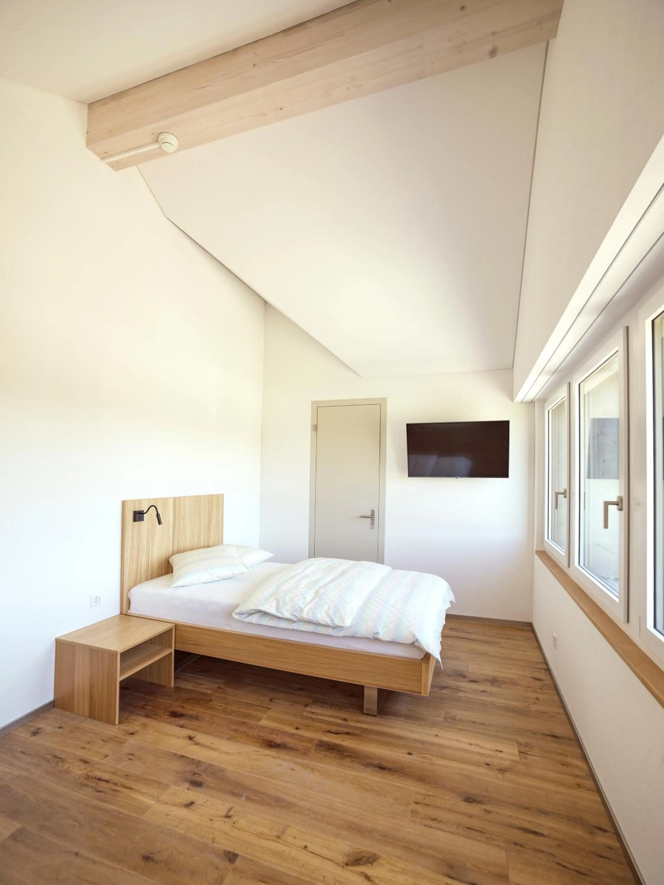 Bed in Hotel Rössli Tufertschwil