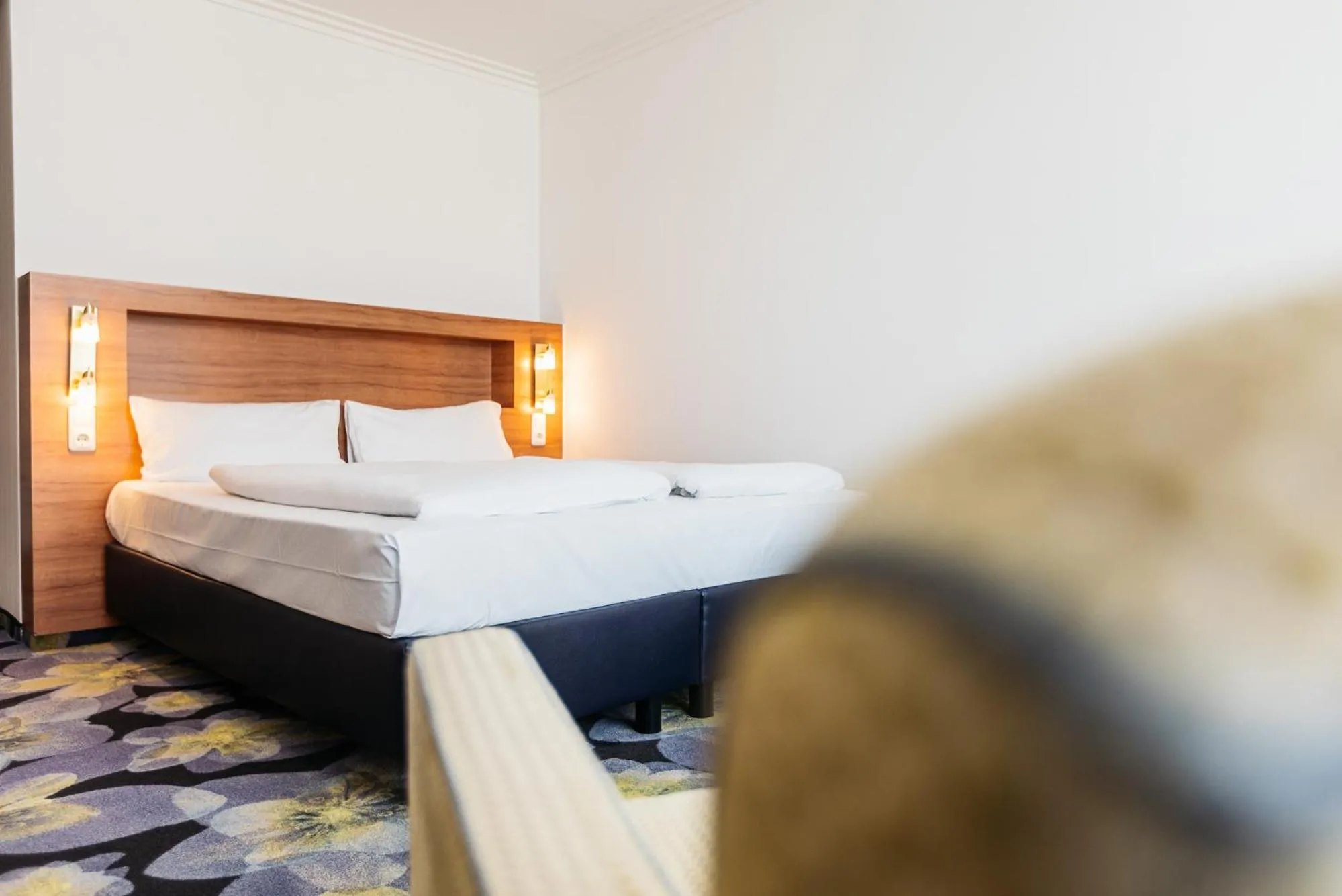 Bed in Vitalia Seehotel