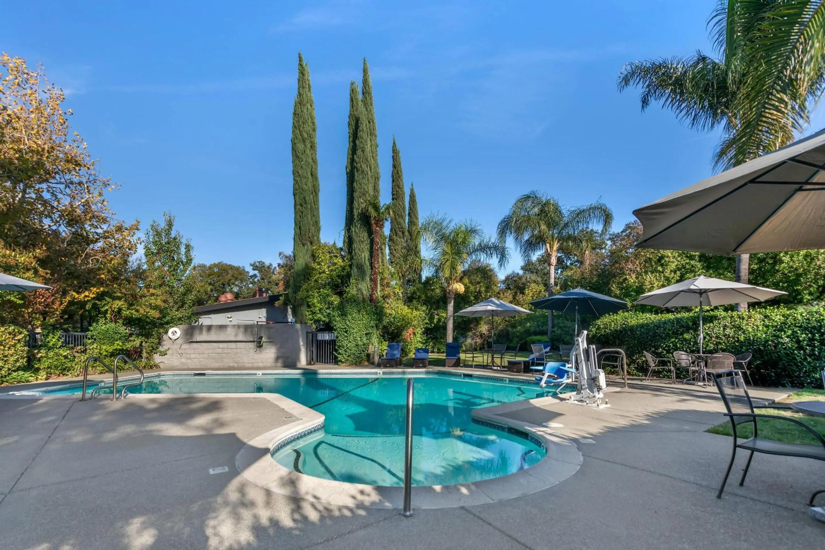 Swimming pool in University Park Inn & Suites, an Ascend Collection Hotel