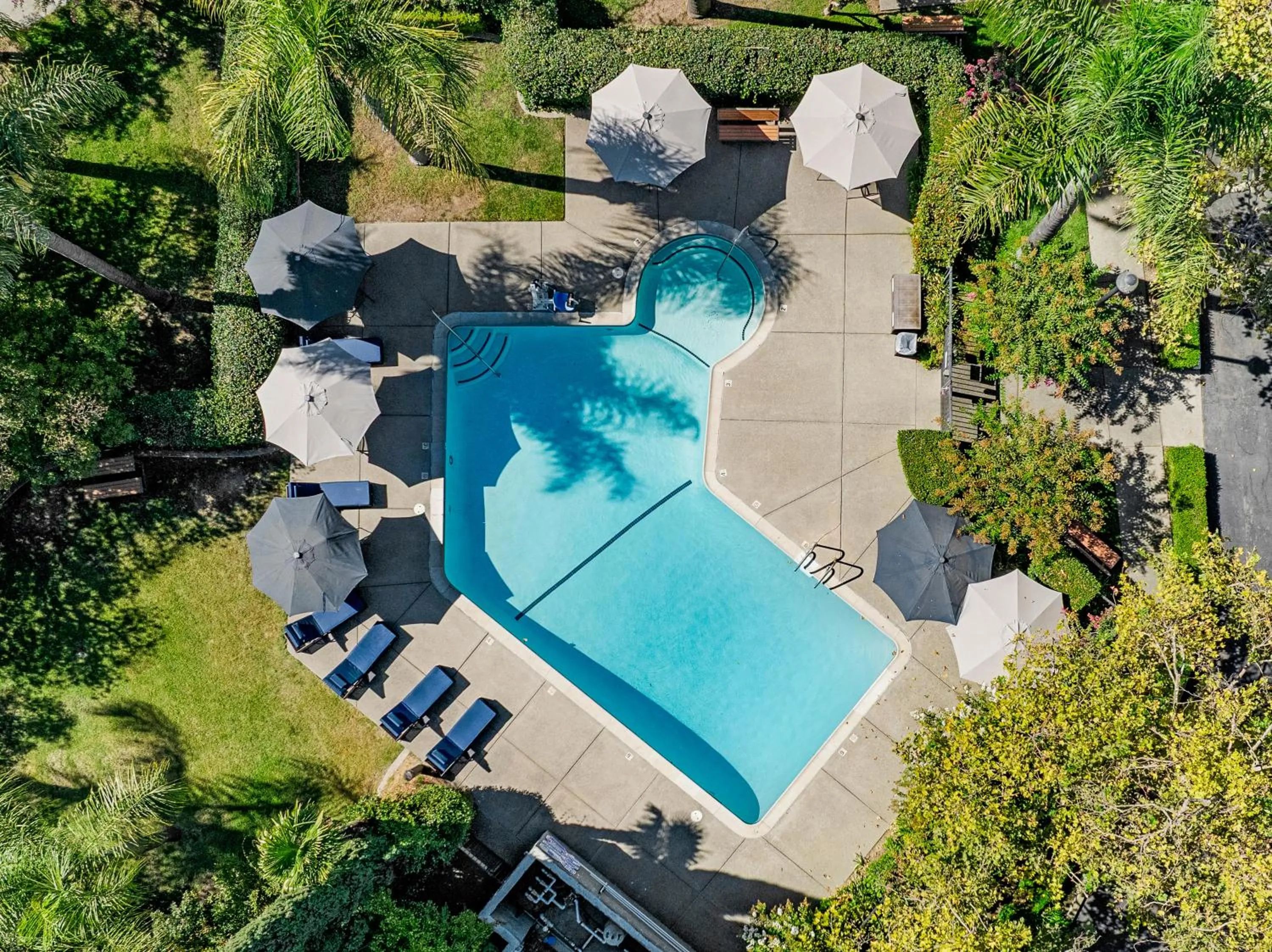 Swimming pool in University Park Inn & Suites, an Ascend Collection Hotel