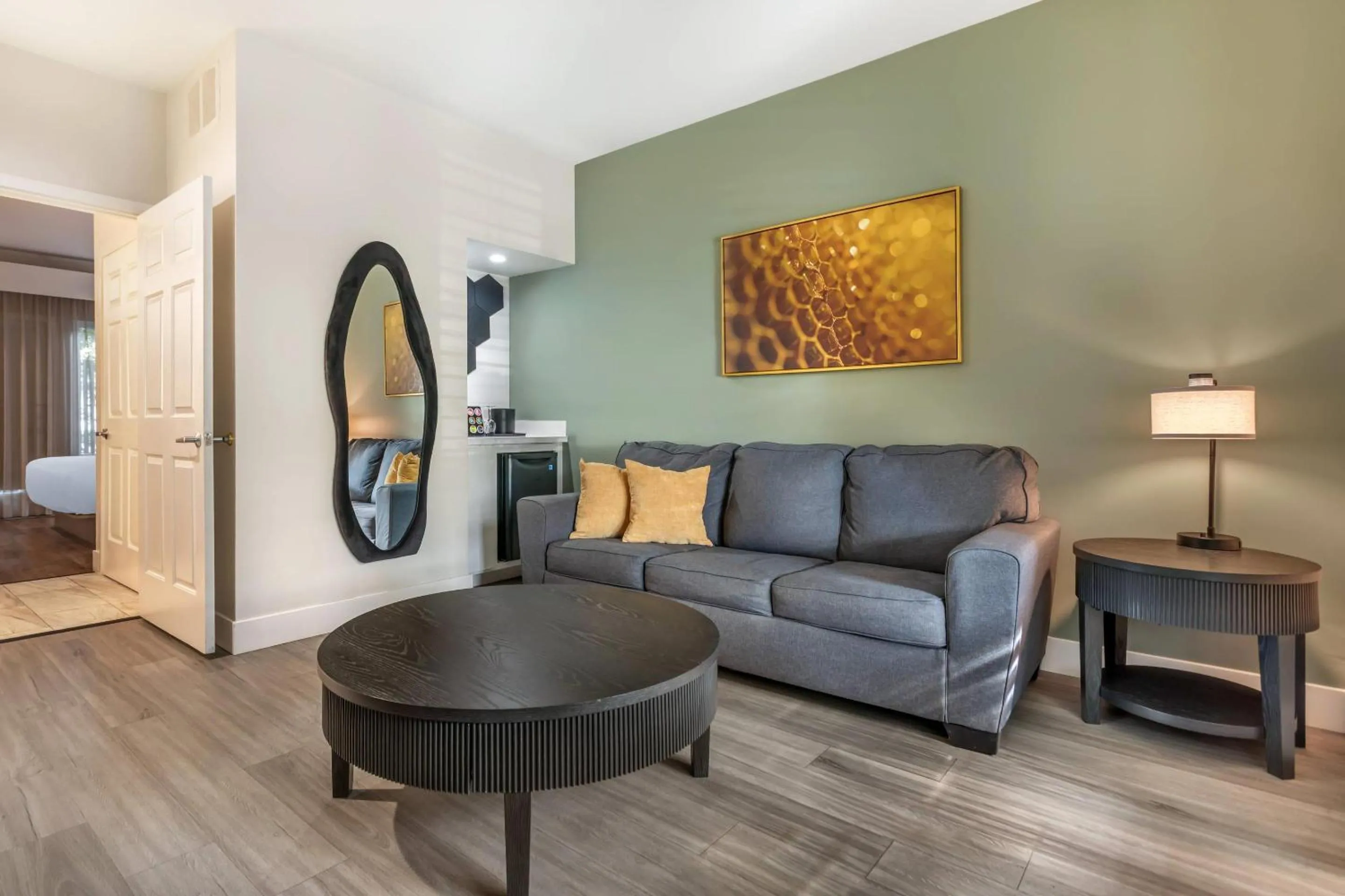 Bedroom in University Park Inn & Suites, an Ascend Collection Hotel