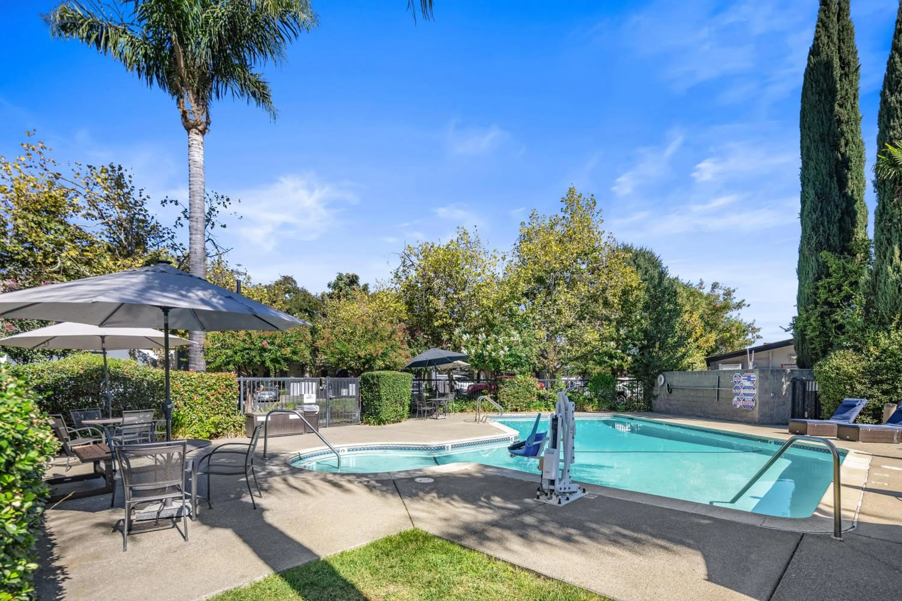 Swimming pool in University Park Inn & Suites, an Ascend Collection Hotel