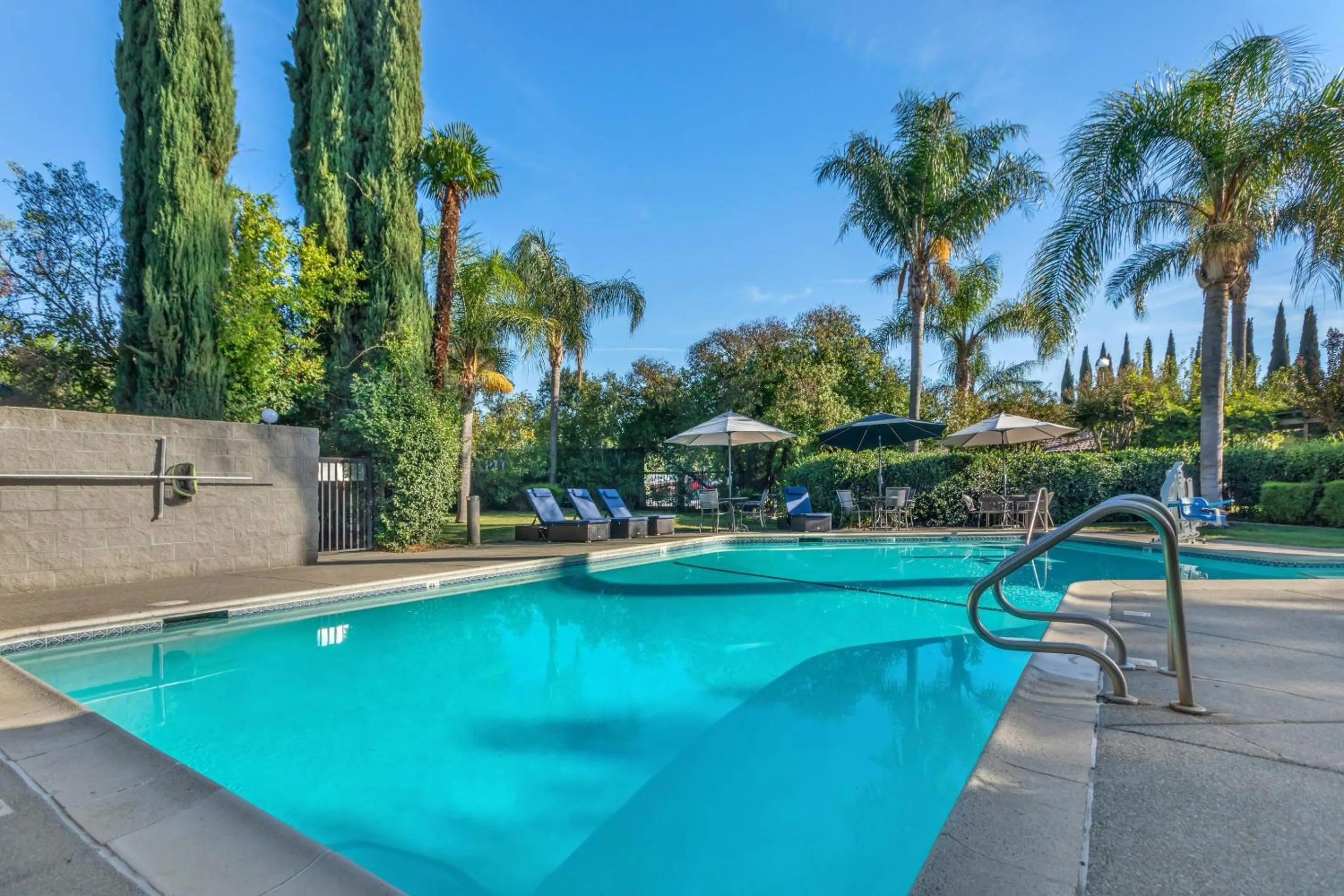 Swimming pool in University Park Inn & Suites, an Ascend Collection Hotel
