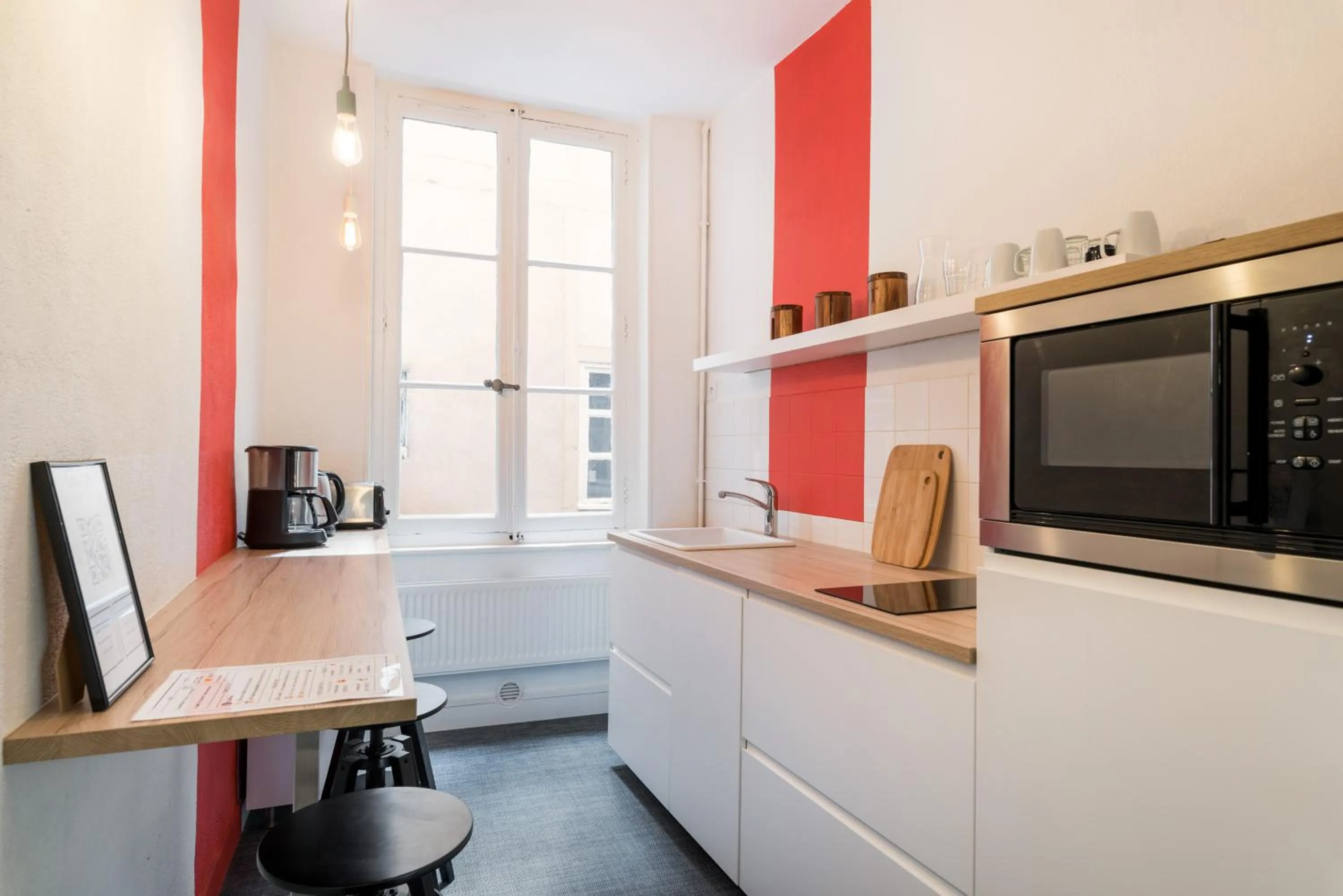Kitchen or kitchenette in Honorê - Suite Trois Maries