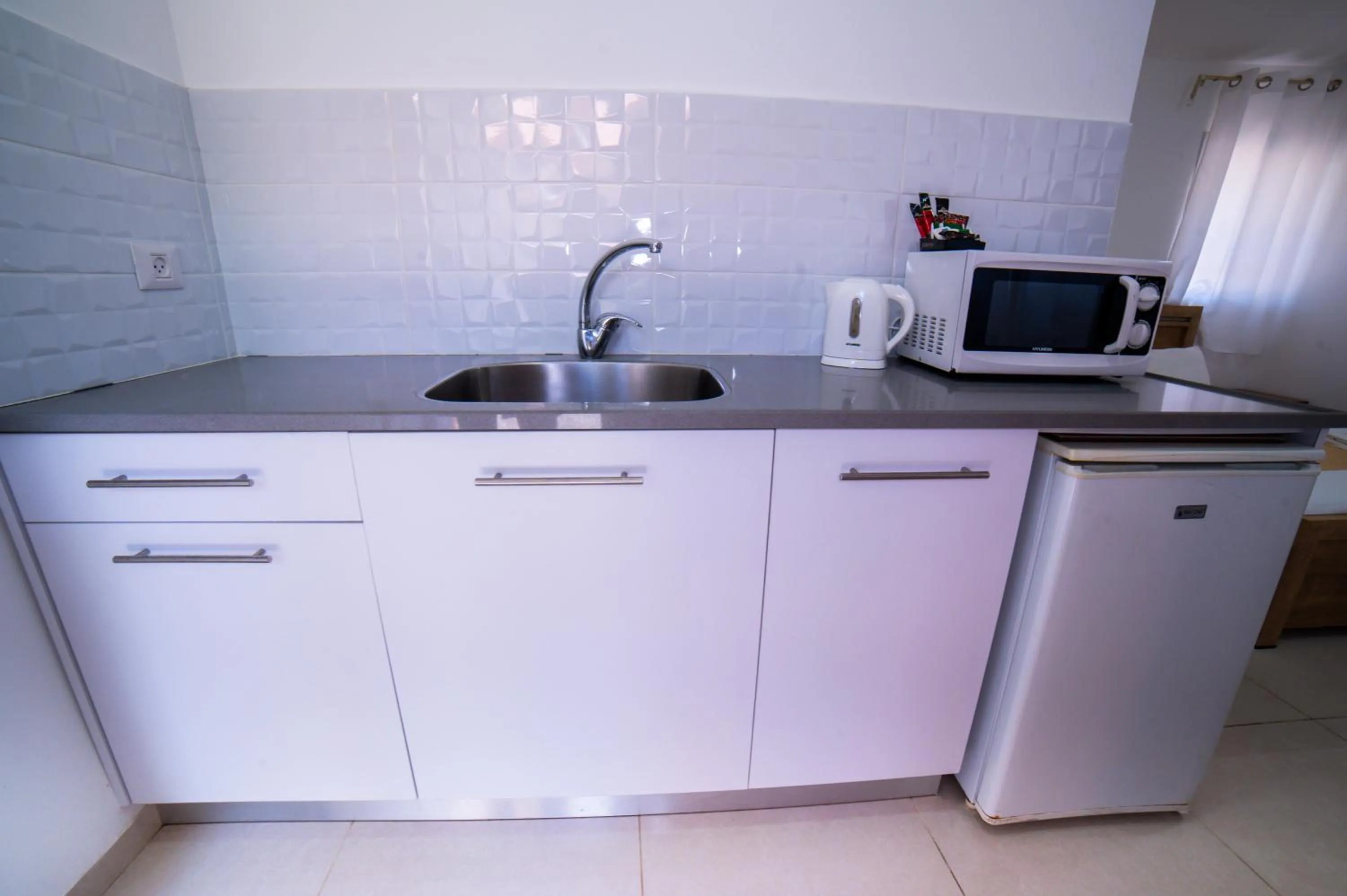 Kitchen or kitchenette in Agamim Hotel Ashkelon