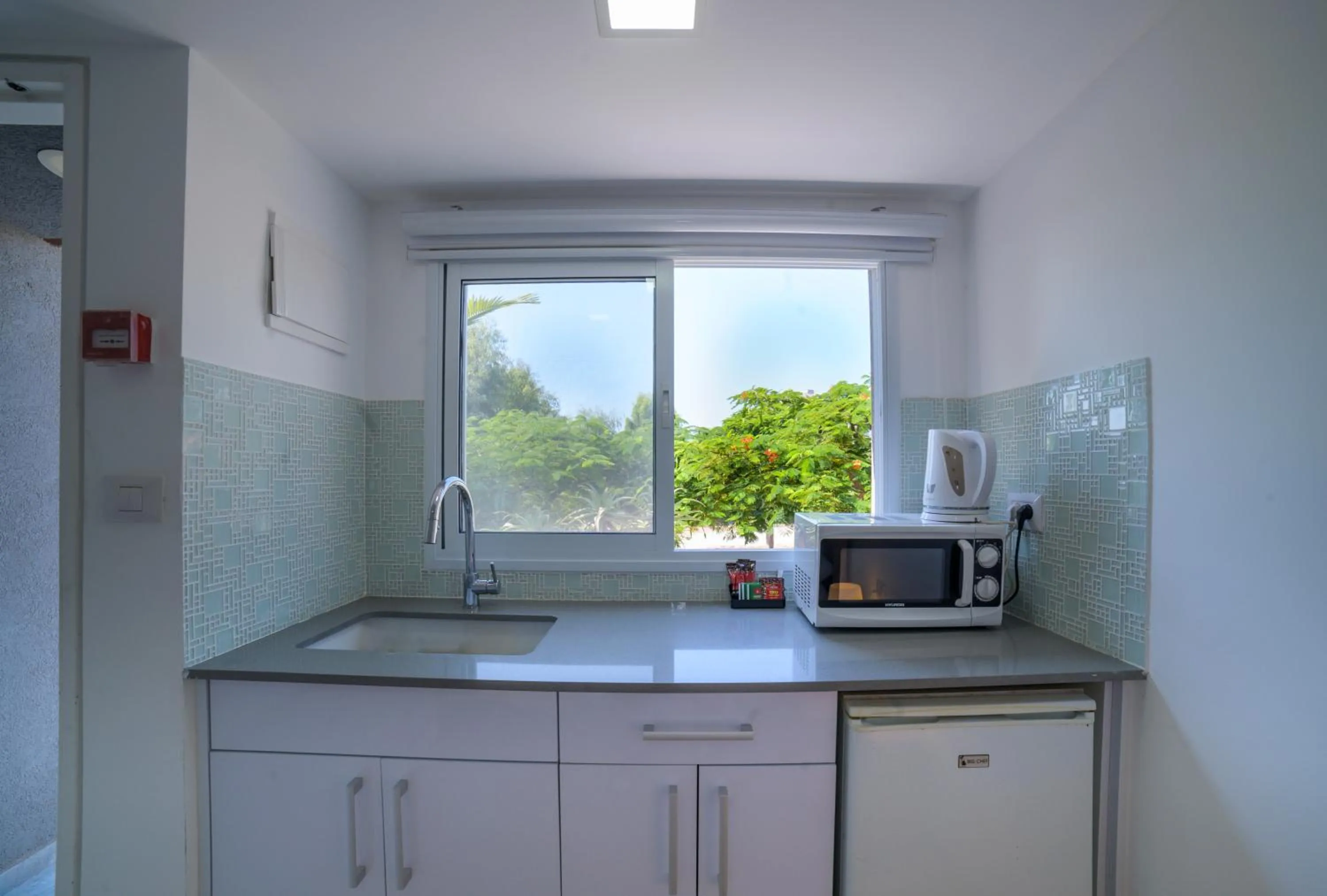 Kitchen or kitchenette in Agamim Hotel Ashkelon