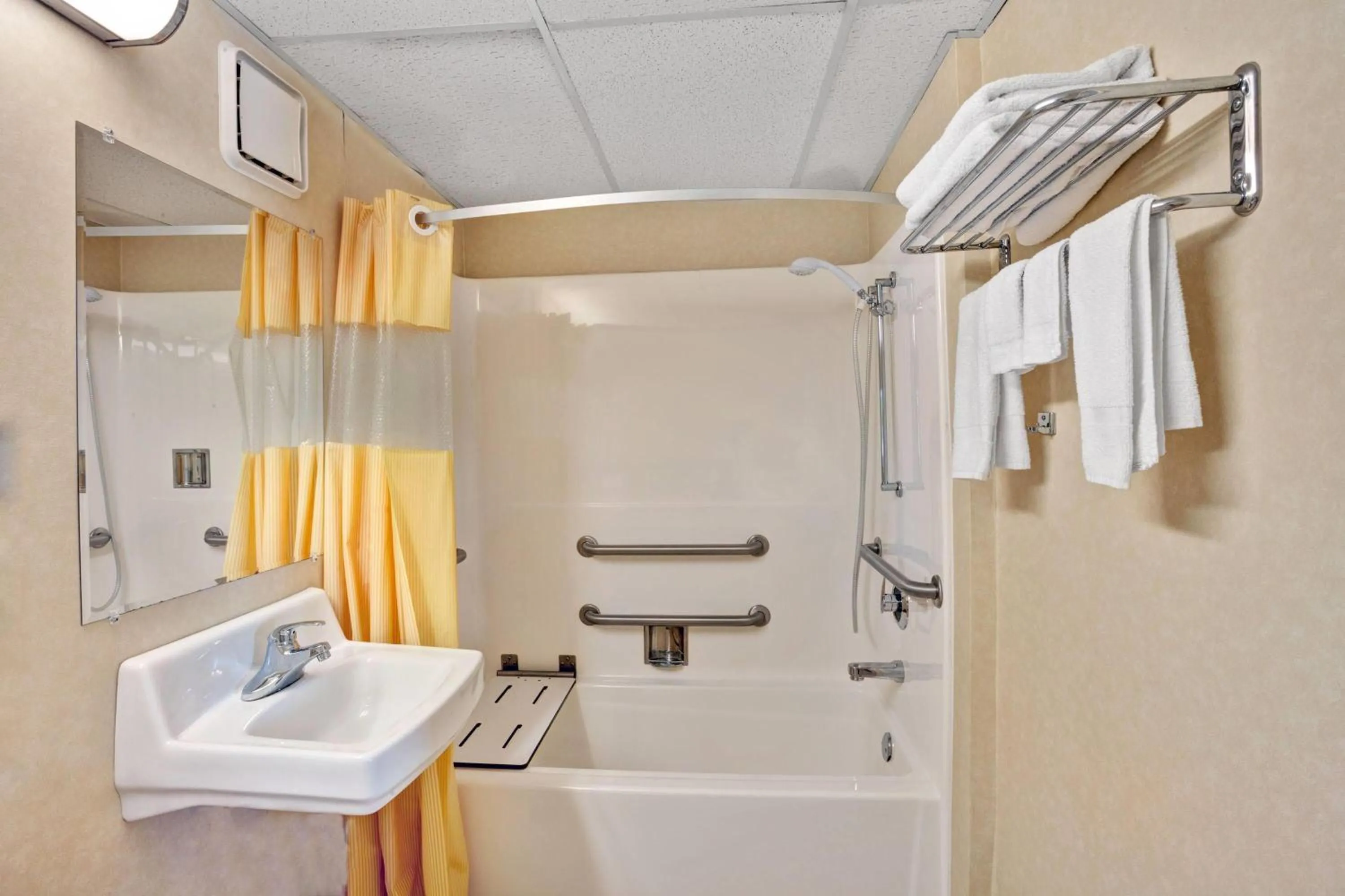Bathroom in Days Inn by Wyndham Louisville Airport Fair and Expo Center