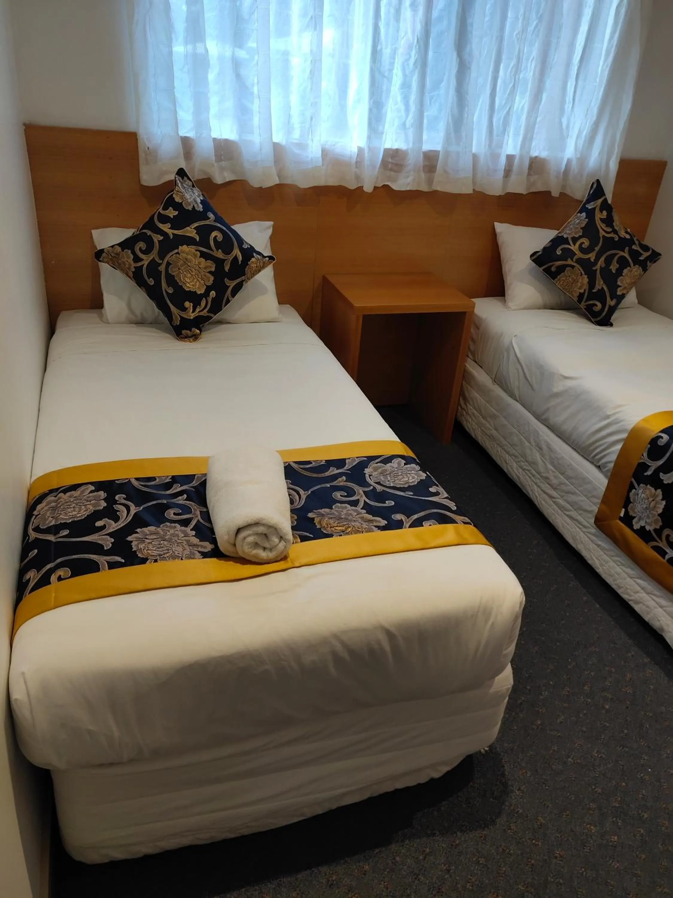 Bed in Coachman Motel and Holiday Units