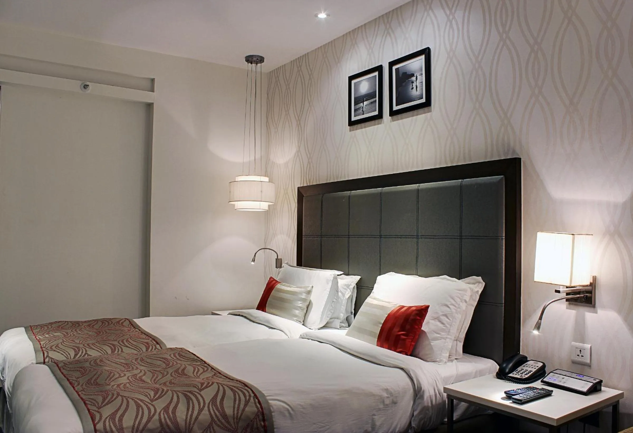 Bed in The Sahil Hotel