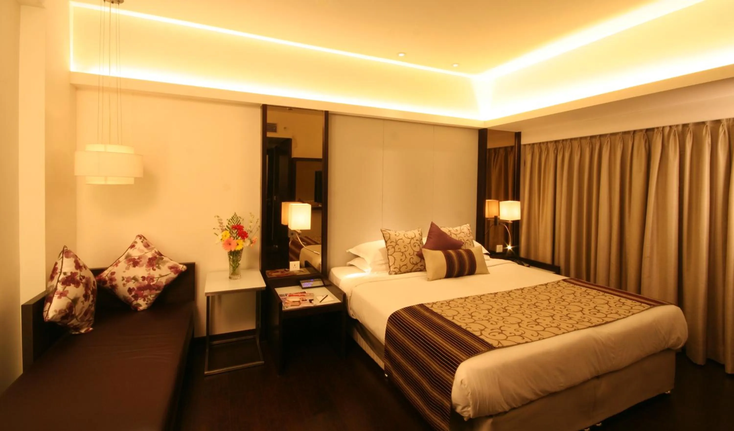 Photo of the whole room, Bed in The Sahil Hotel