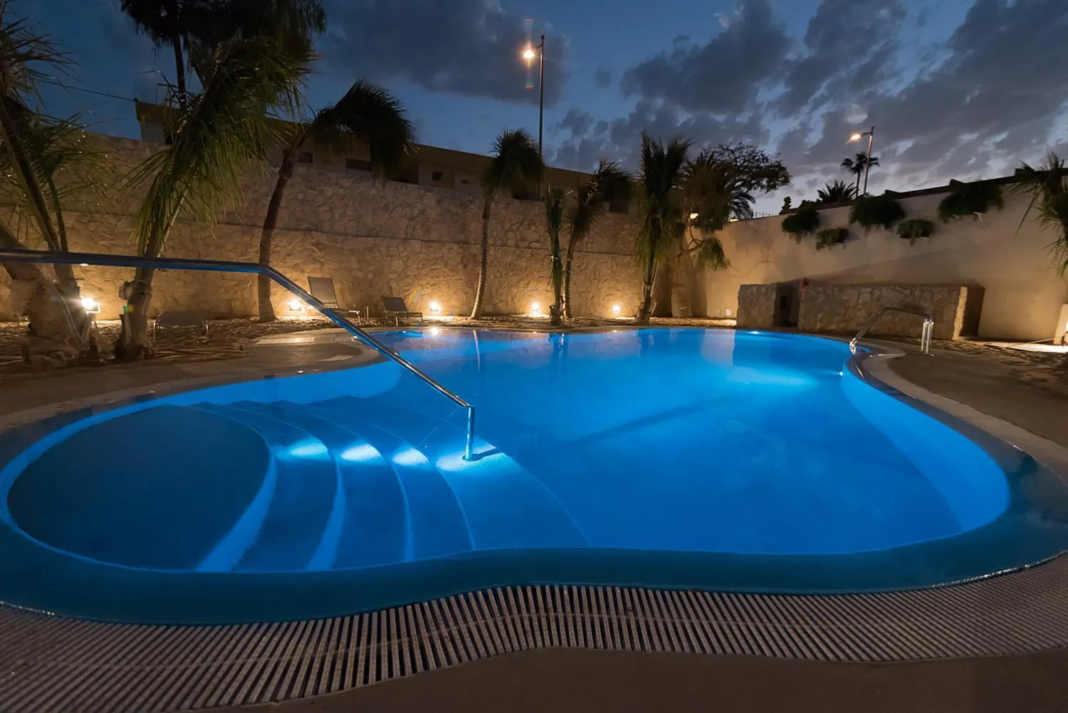 Swimming pool in Alhambra Boutique Apartments by PMC Resorts