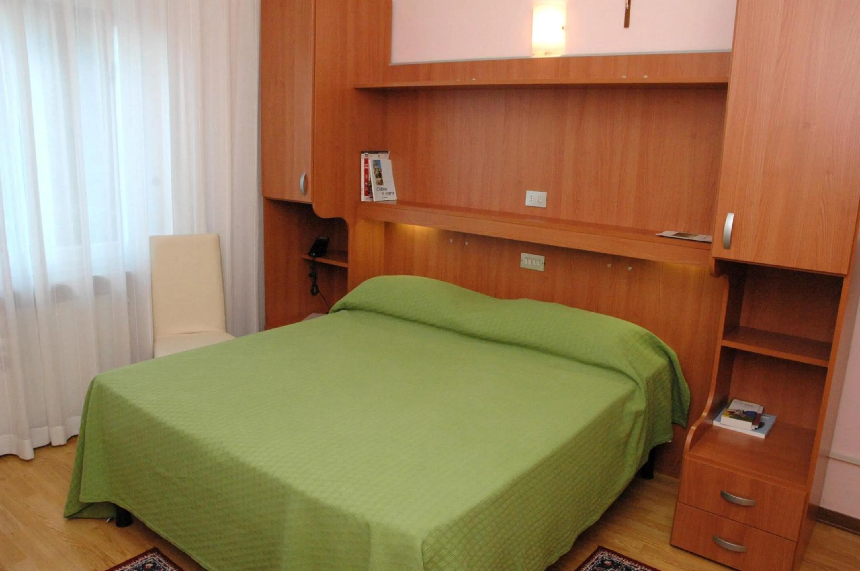 Bed in Hotel Da Angela