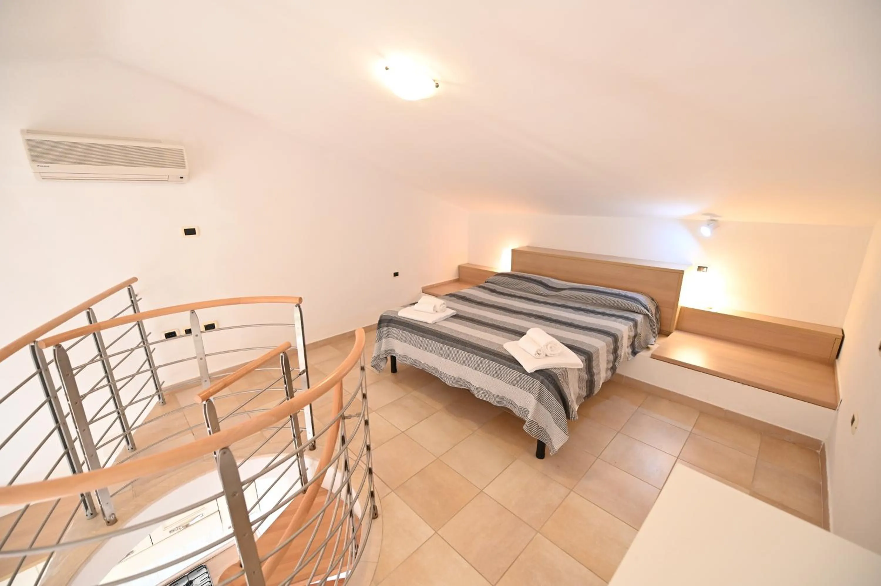 Photo of the whole room, Bed in Aba Village RTA