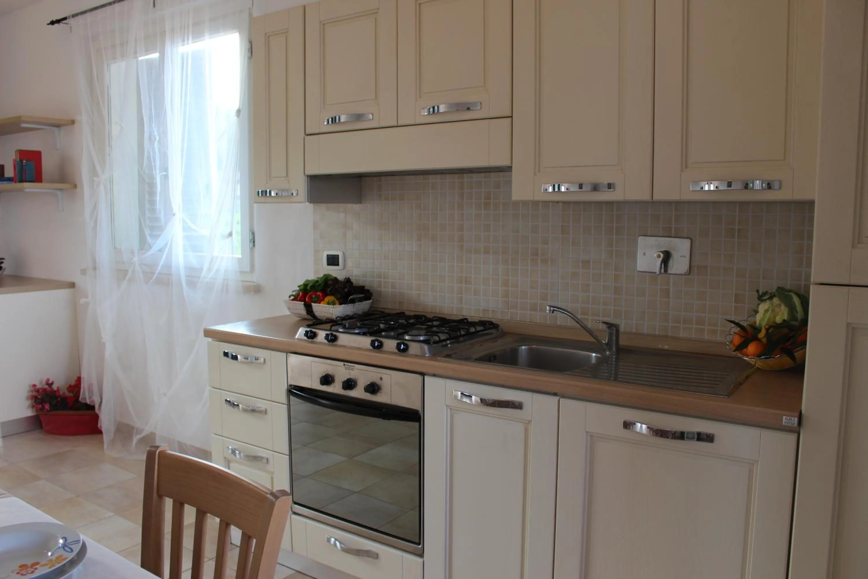 Kitchen or kitchenette in Aba Village RTA