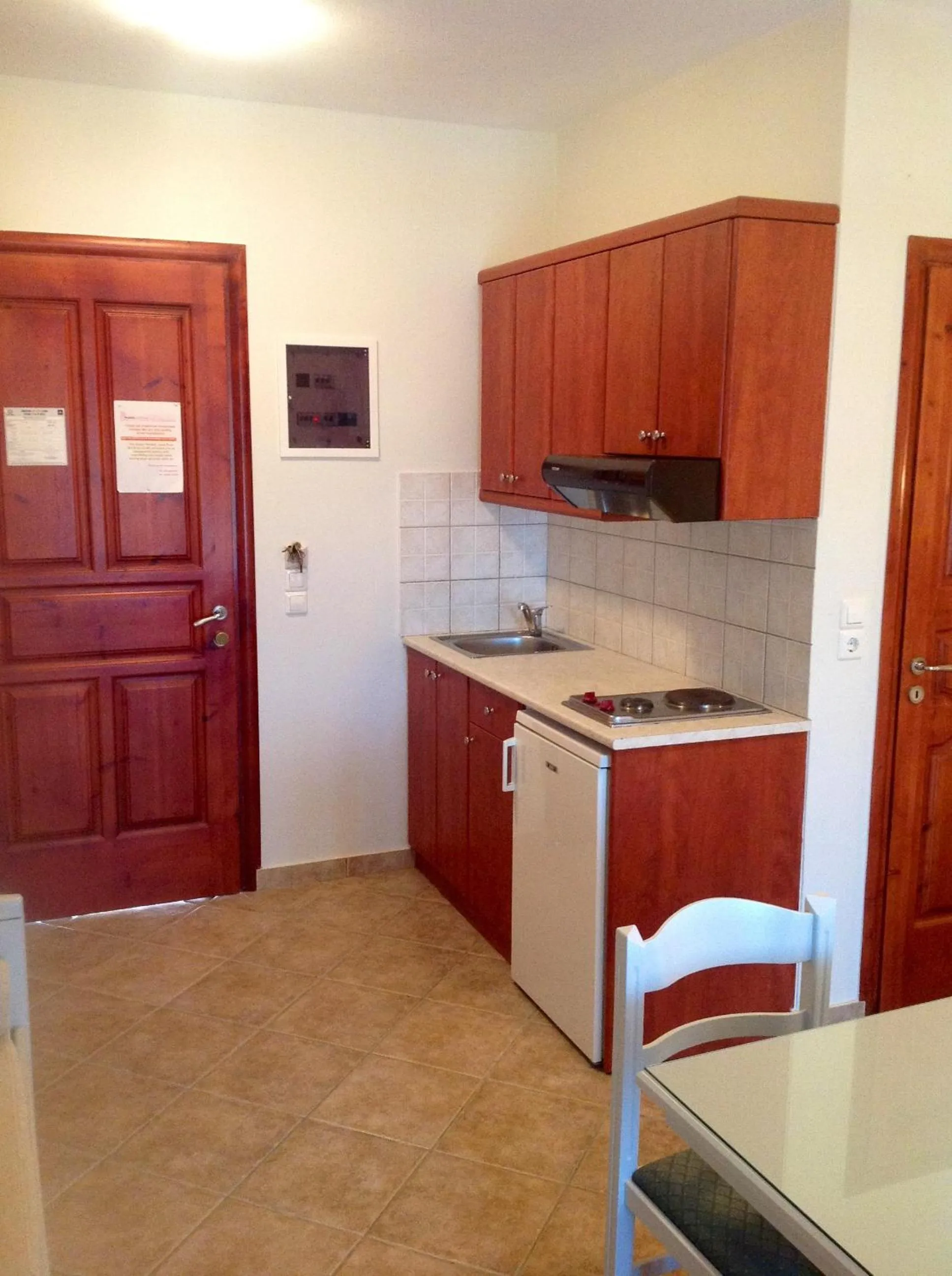 Kitchen or kitchenette in Plaka Hotel I
