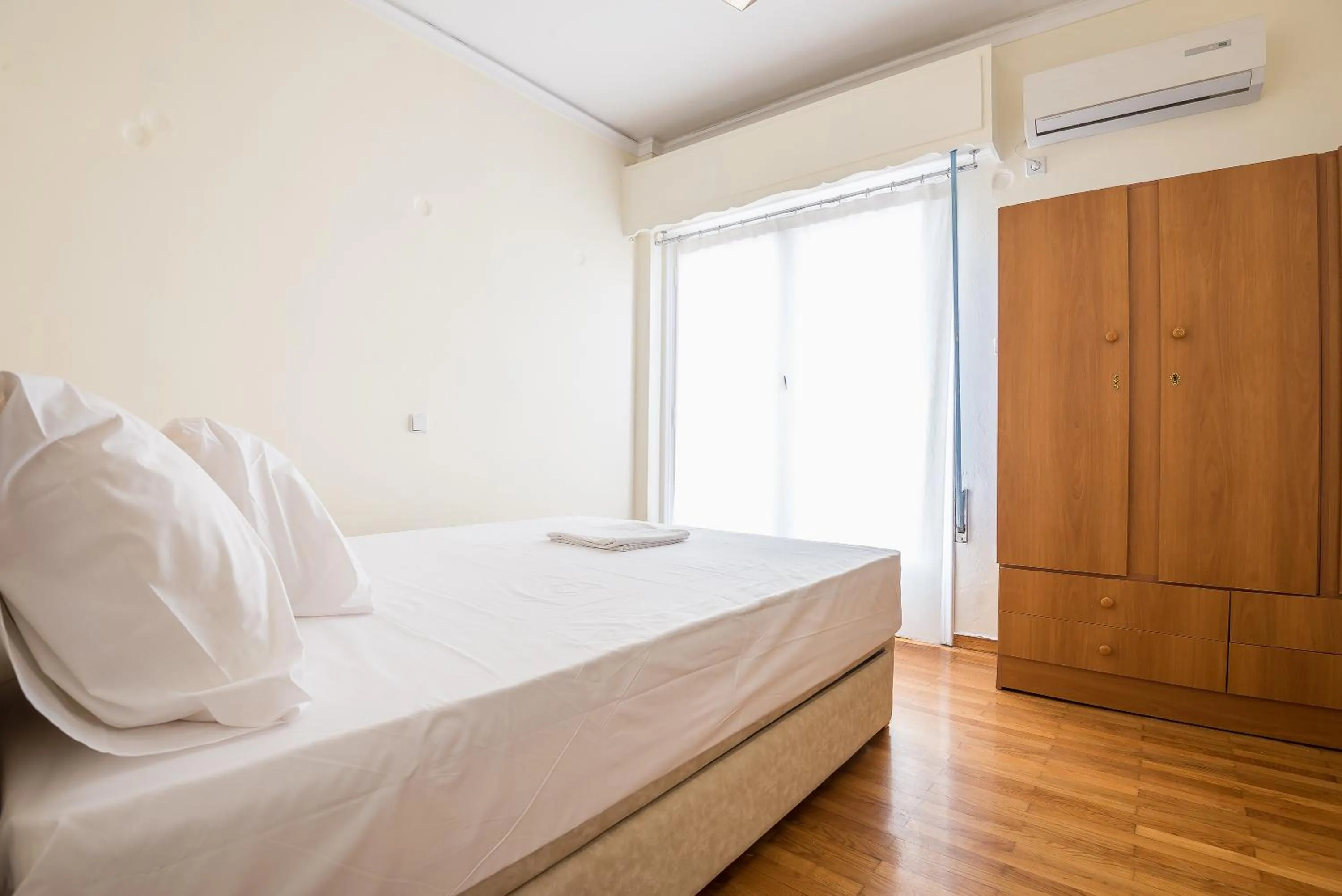 Bed in Acropolis View Paradise Apartments