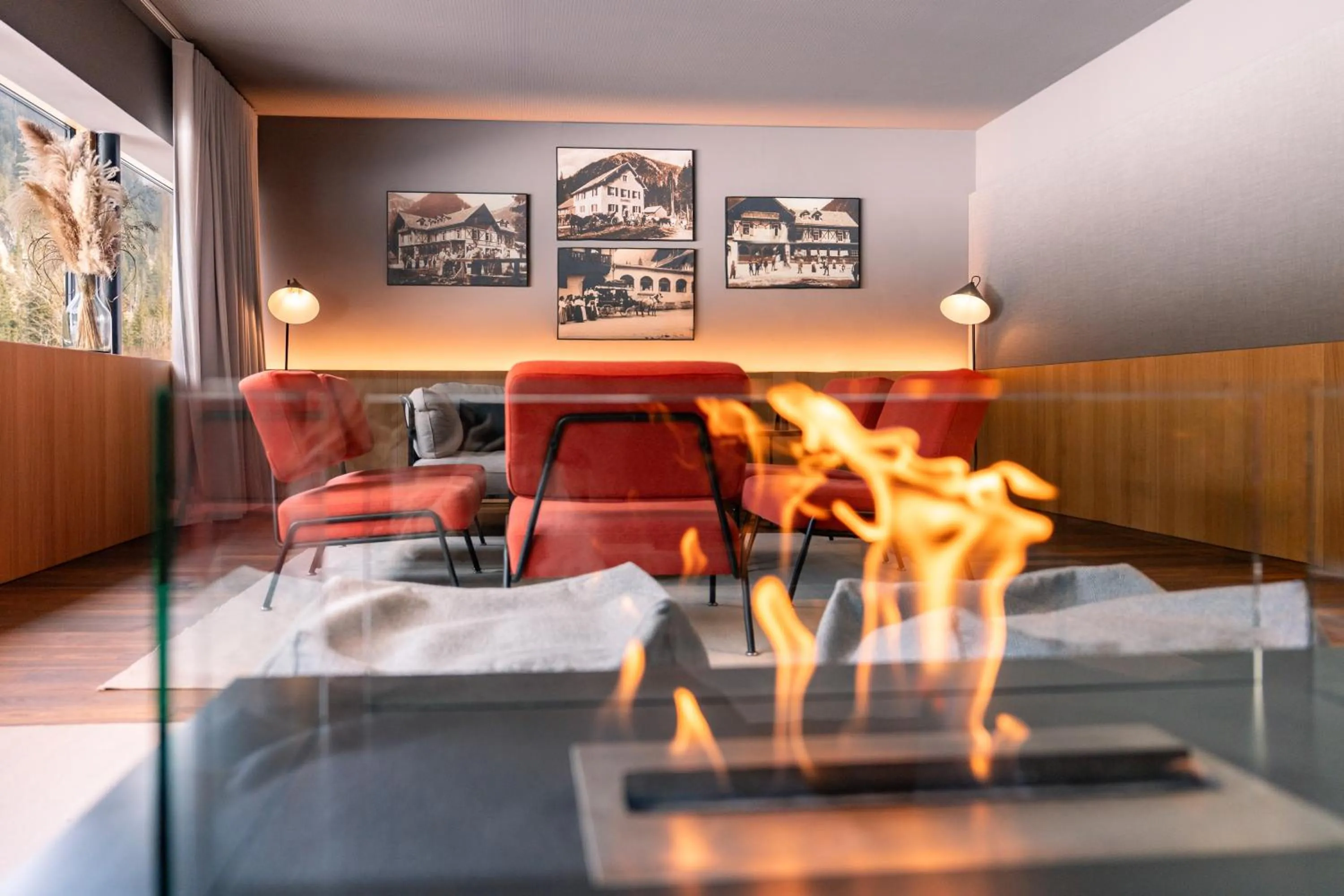 fireplace, Bed in Alpenhotel Ammerwald