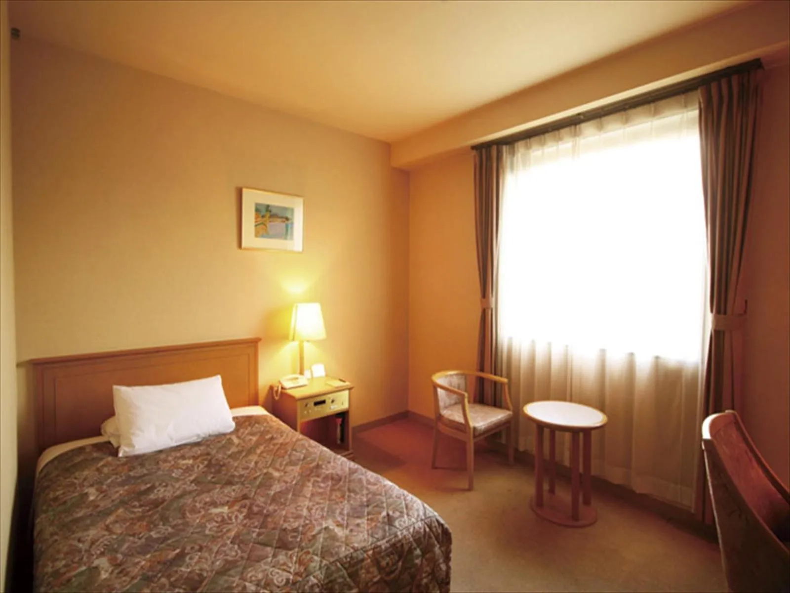 Living room, Bed in Fukuno Town Hotel A・Mieux