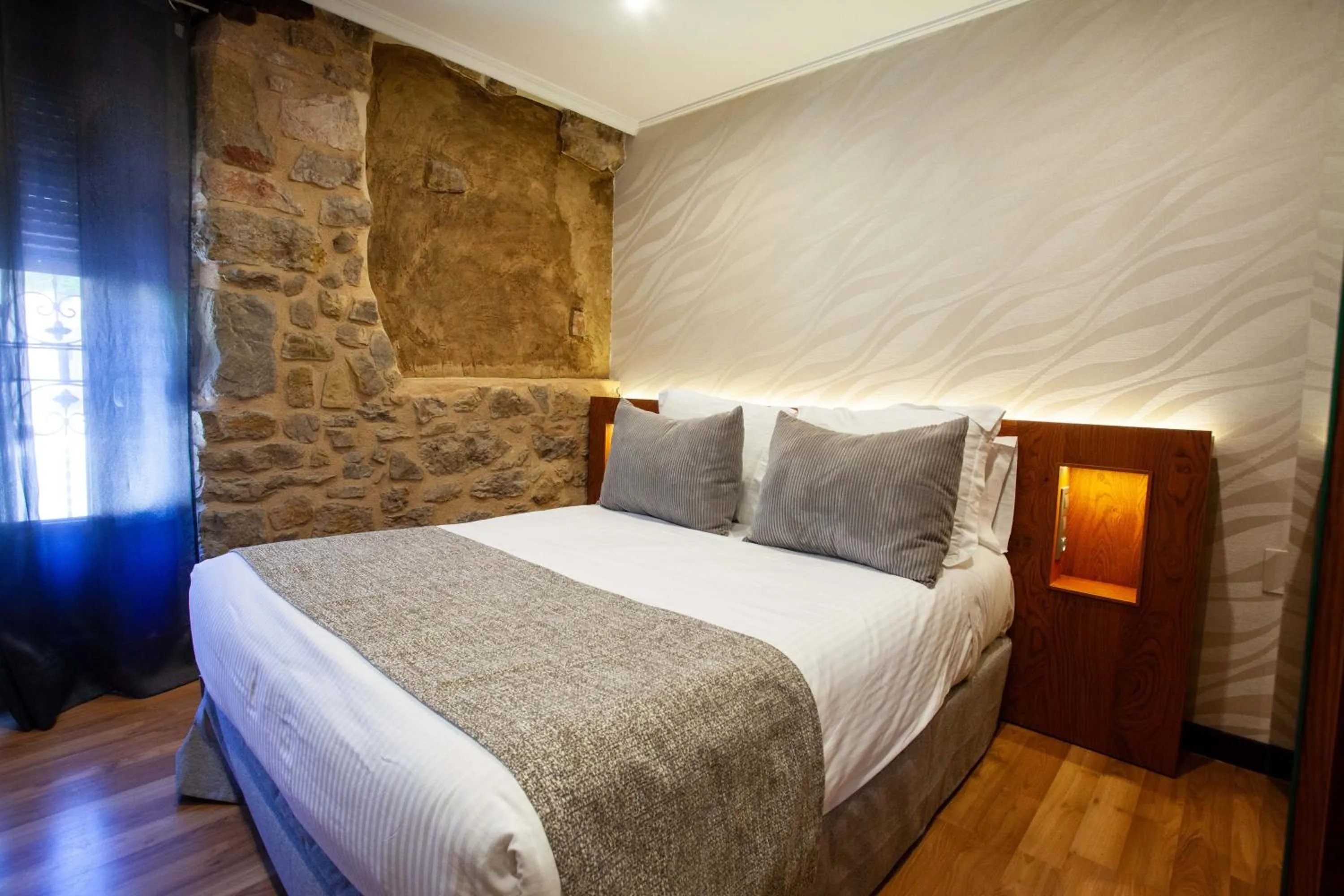 Bed in Hotel El Doncel