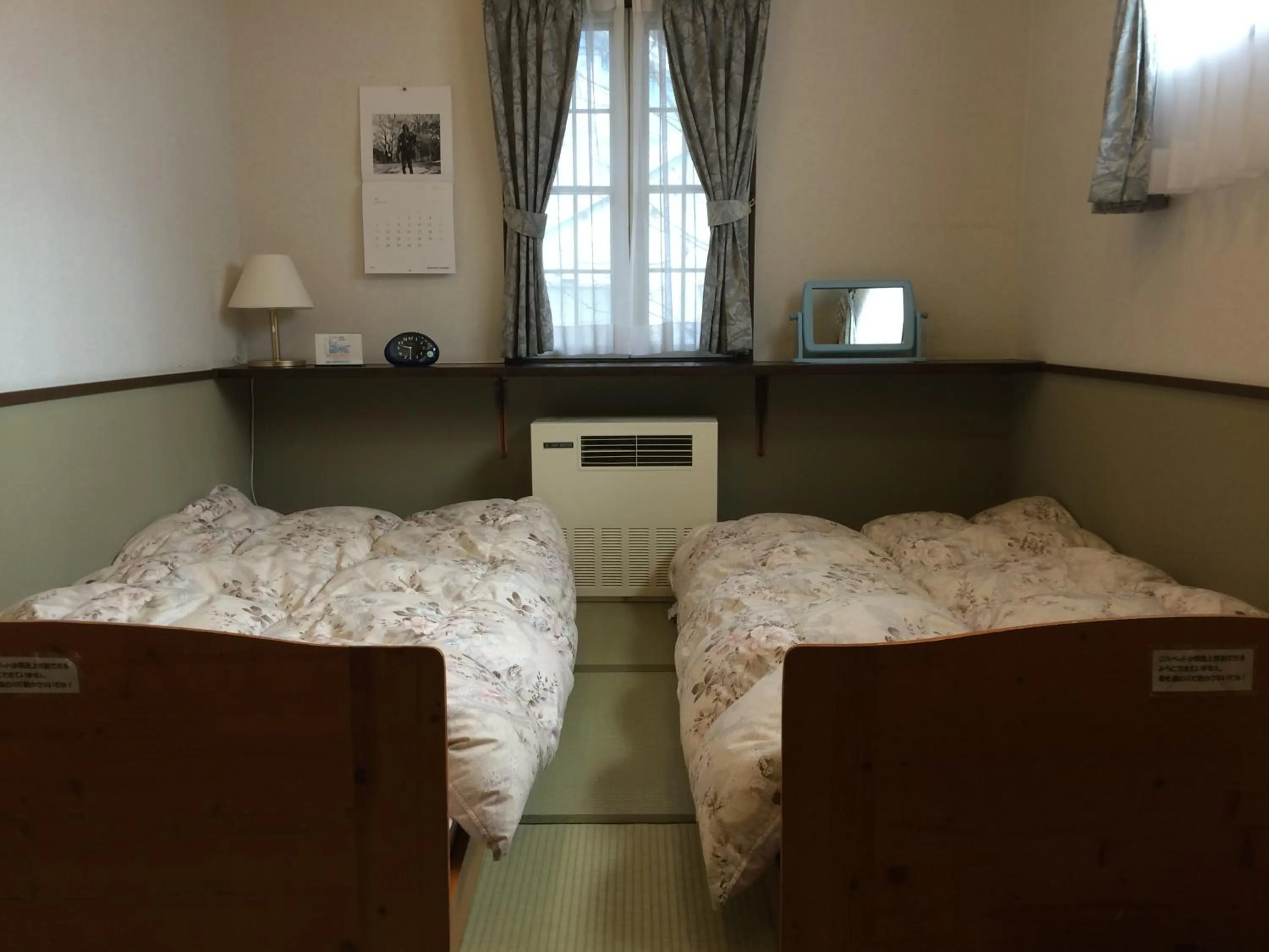 Bed in Shikino Yado Subaru