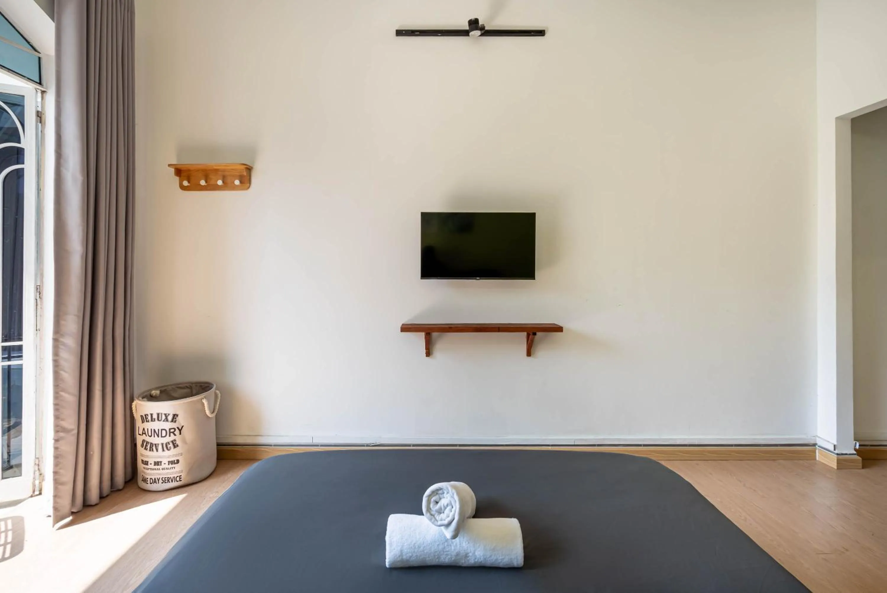 TV and multimedia in HoLo Fairy House Saigon - Serviced Homestay