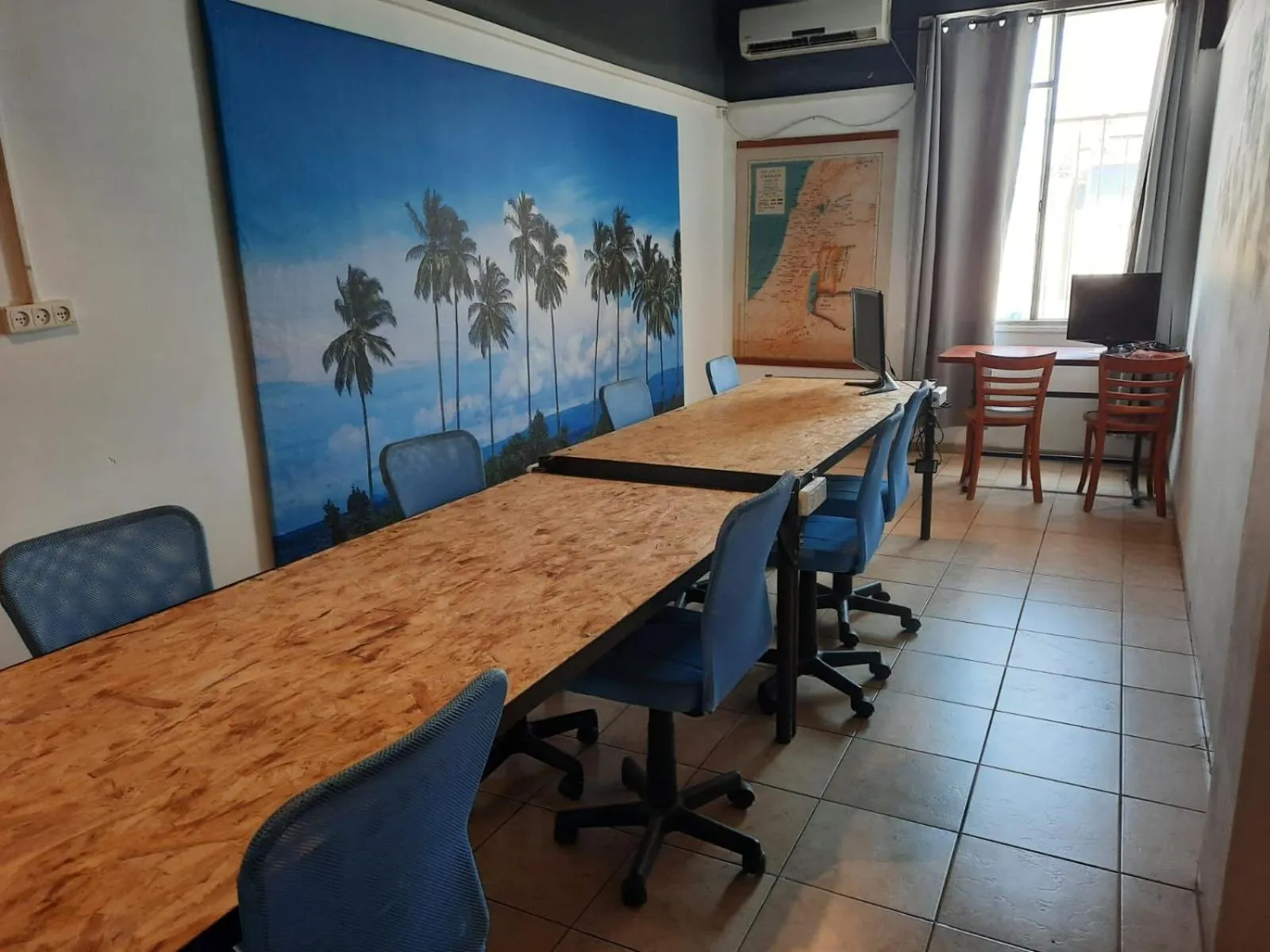 Communal lounge/ TV room in Tiberias Hostel