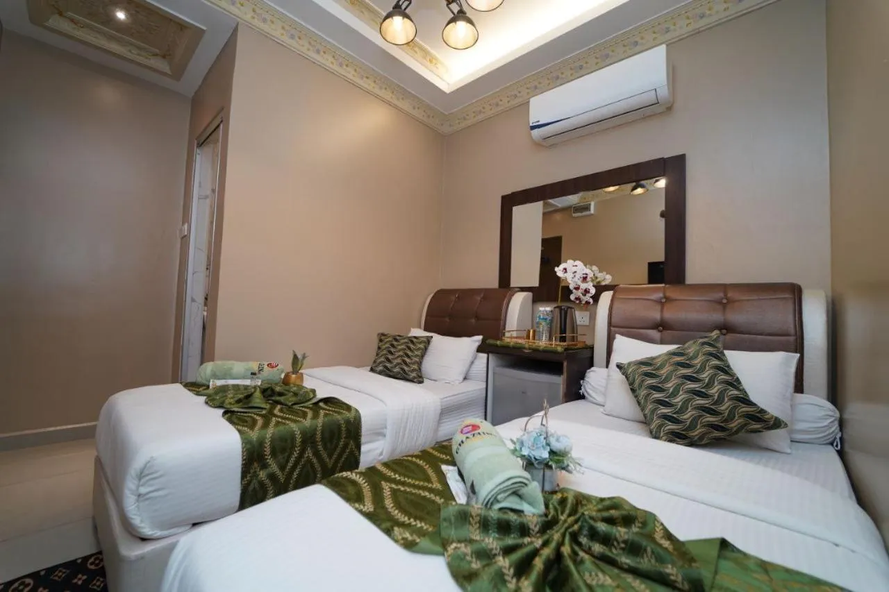 Bed in Ghazrin's Classic Hotel JB