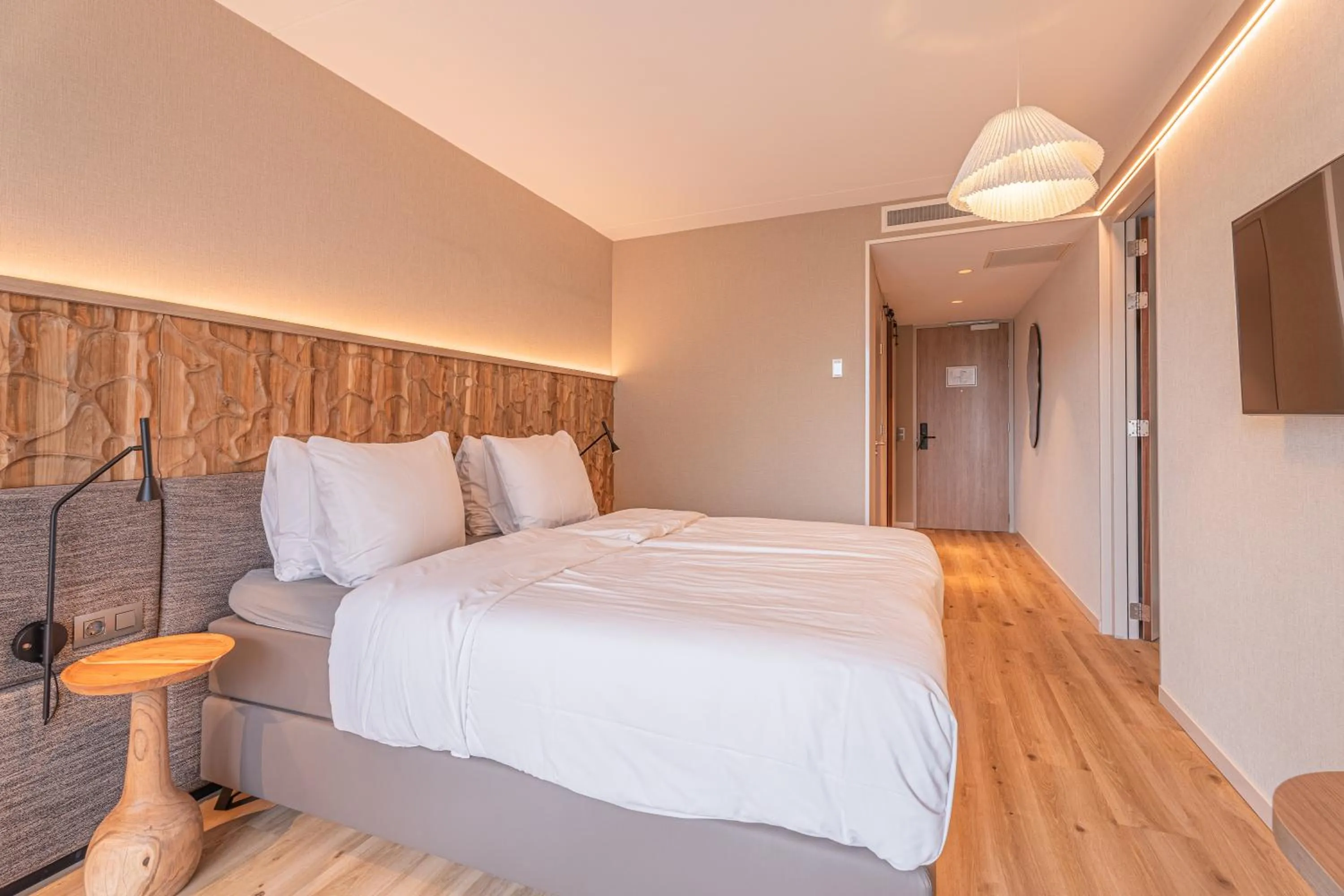 Bed in Strandhotel Duinoord