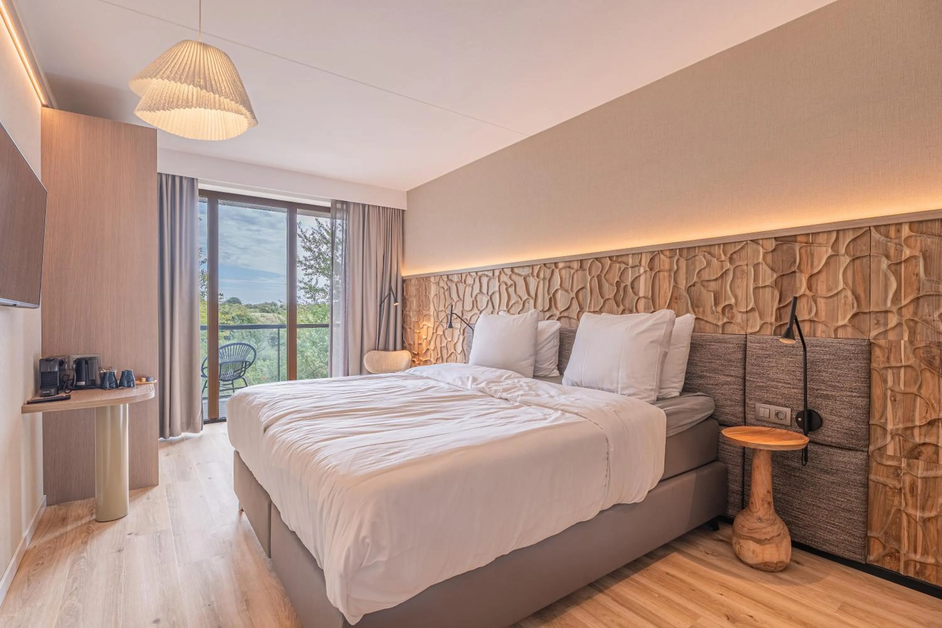 Bed in Strandhotel Duinoord