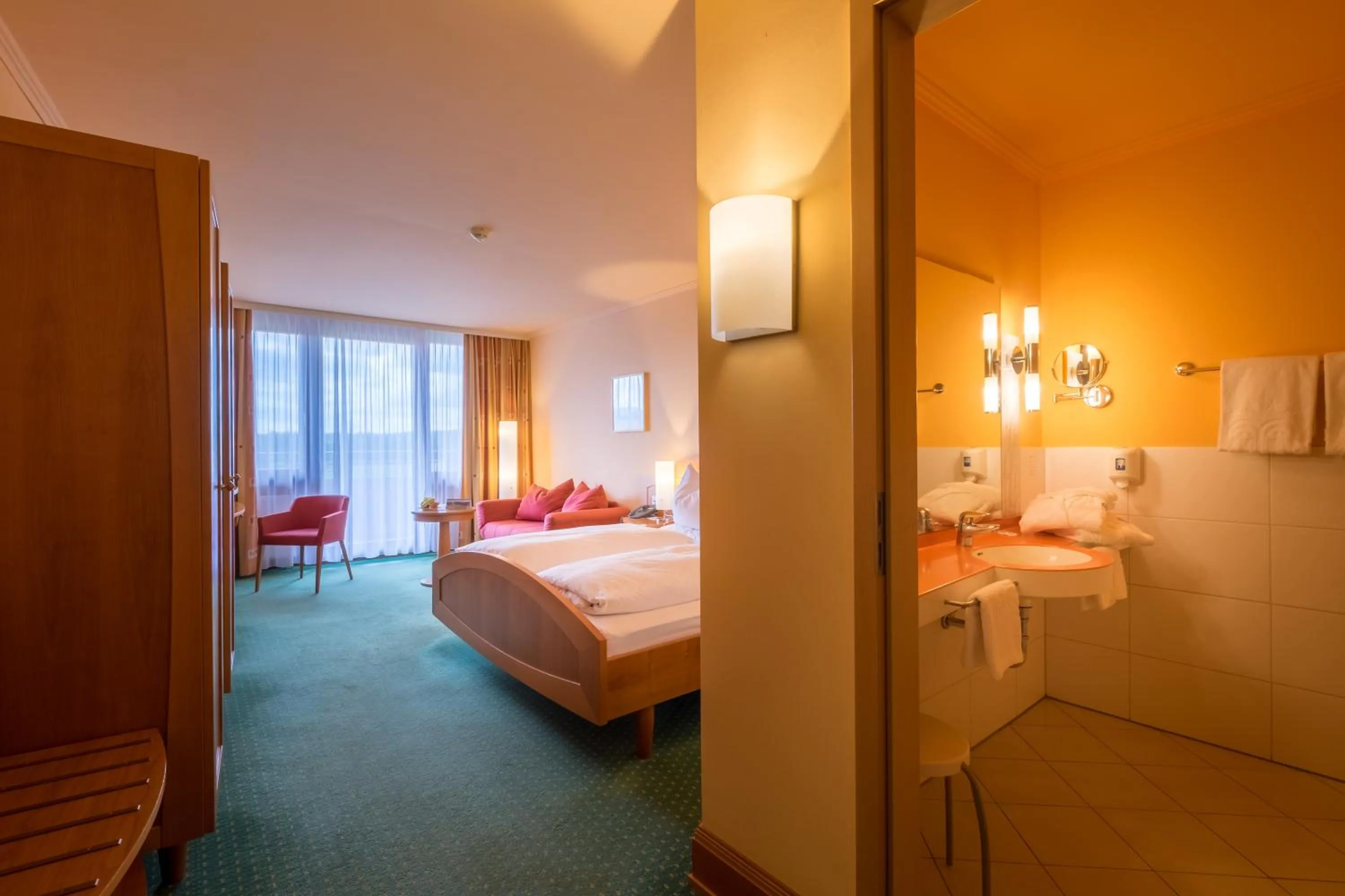 Photo of the whole room, Bed in Gesundheitshotel Weißenstadt am See