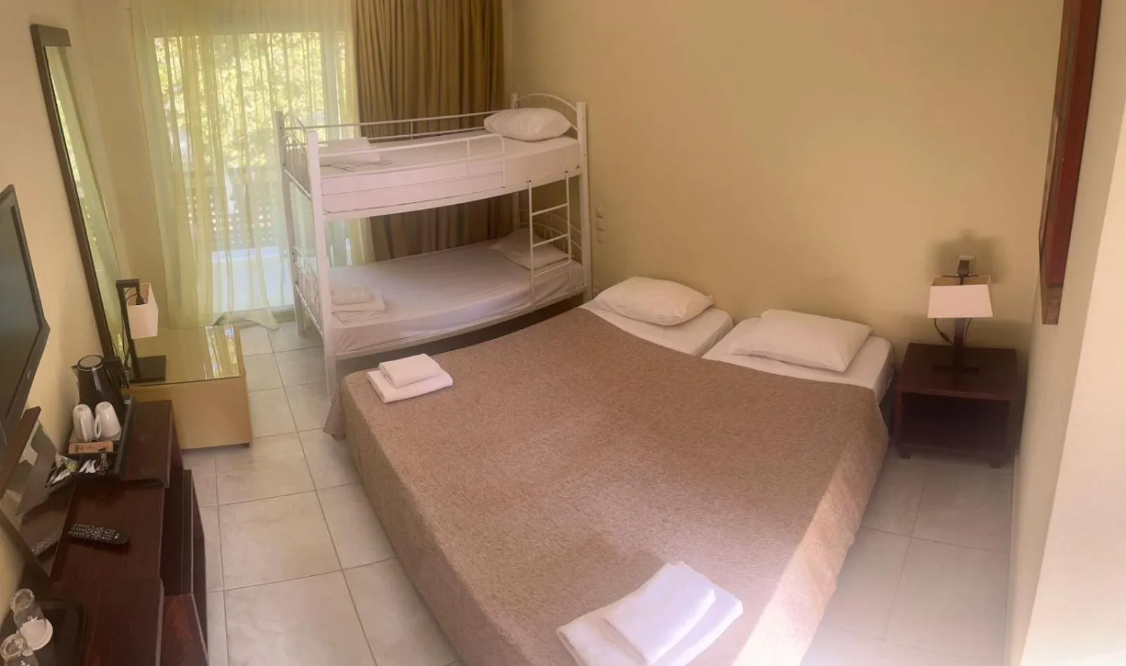 Bed in Olympian Bay Grand Resort