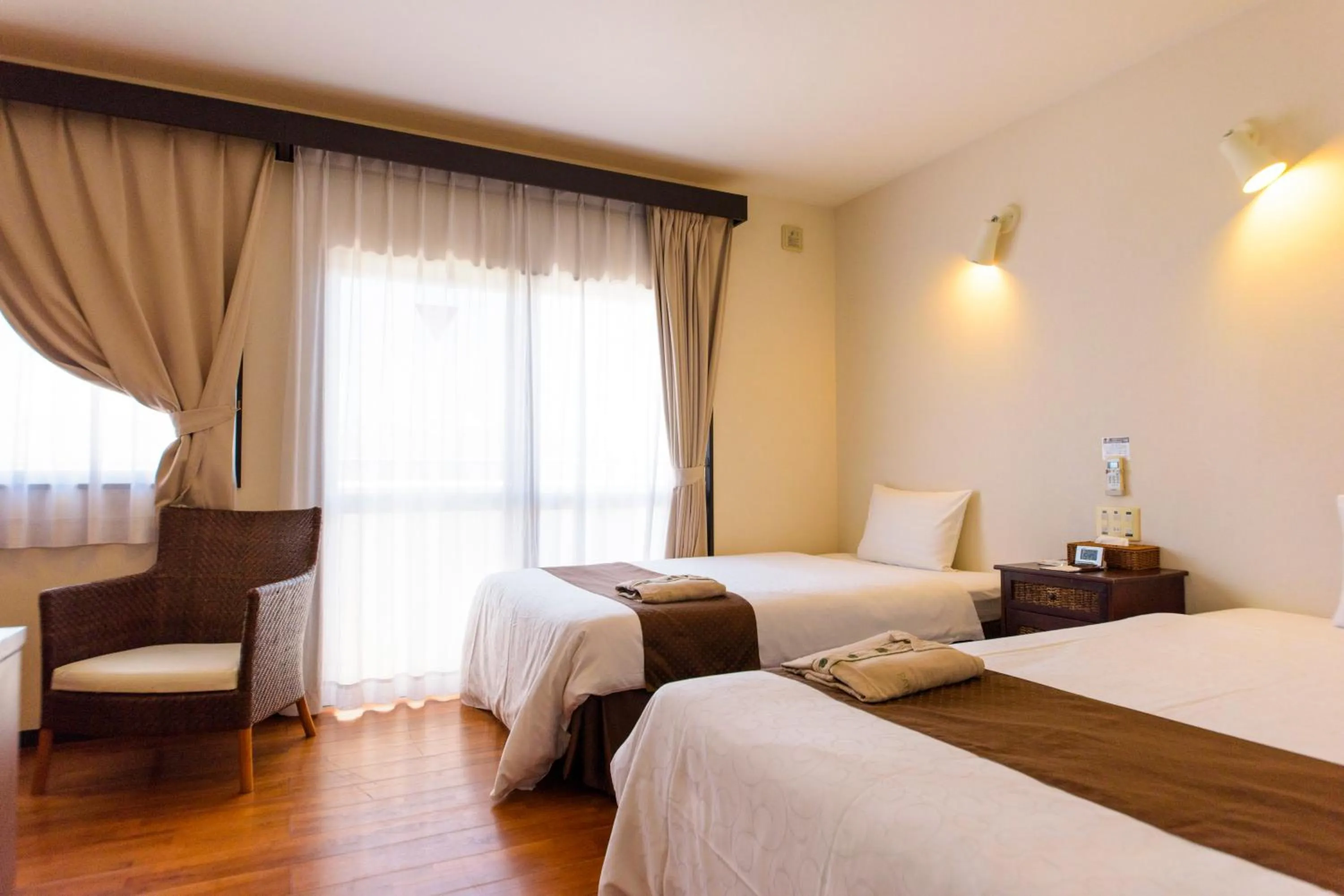 Photo of the whole room, Bed in Hotel Patina Ishigakijima