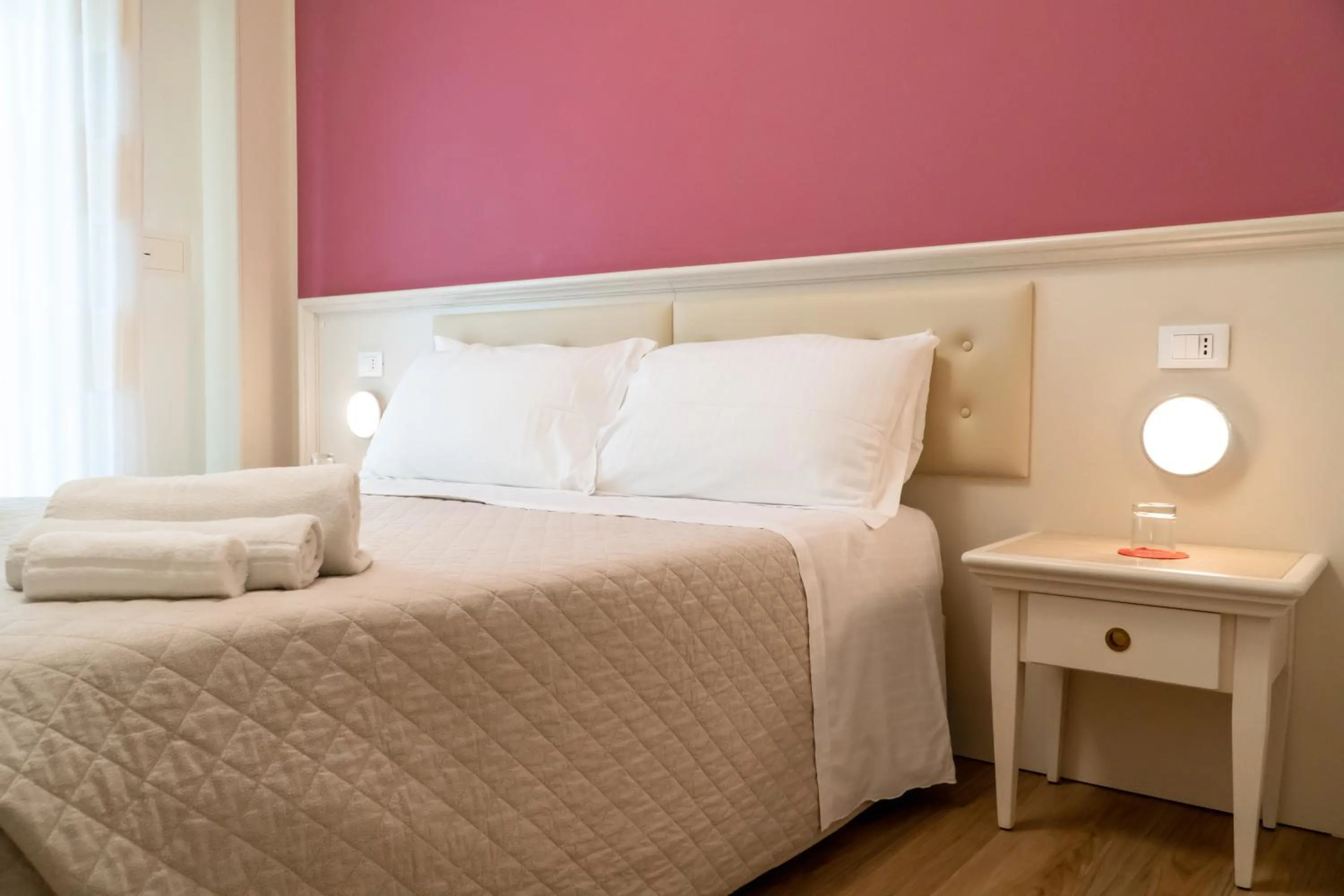 Bed in Hotel Orchidea