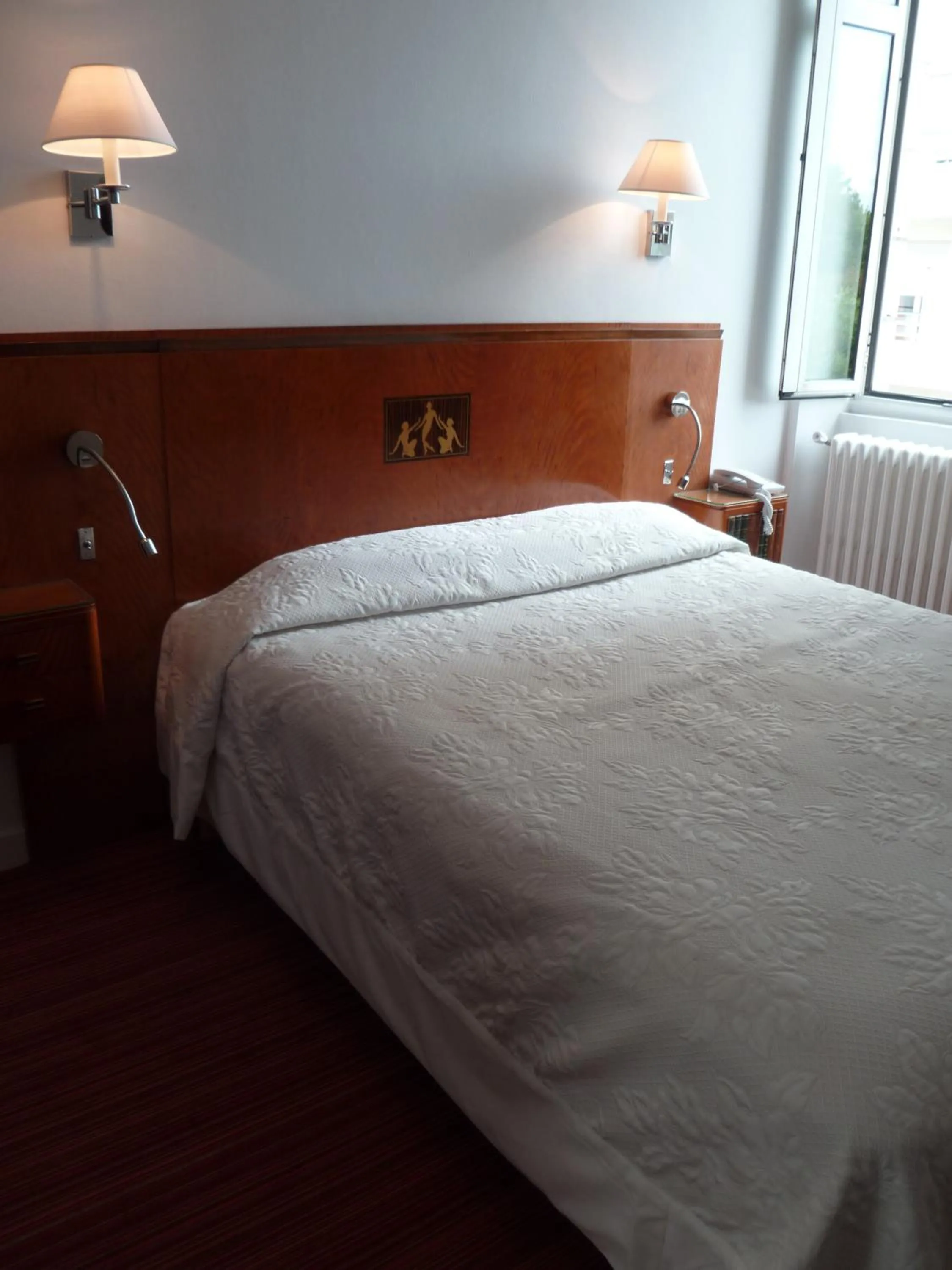 Bed in Hôtel Maïtagaria